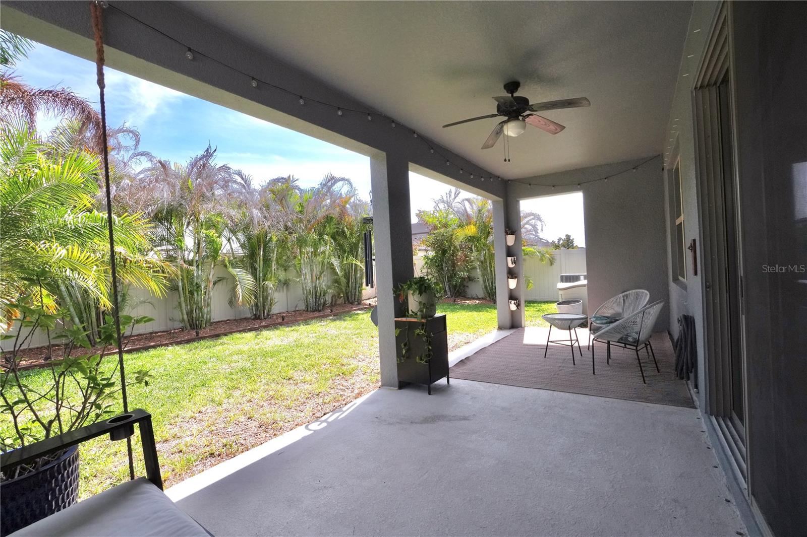 Spacious covered lanai and fully fenced backyard.