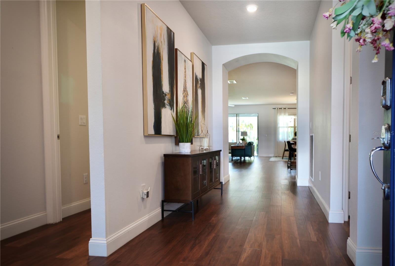 Spacious foyer. 2 secondary bedrooms and bathroom located in the hallway to the left of the foyer.