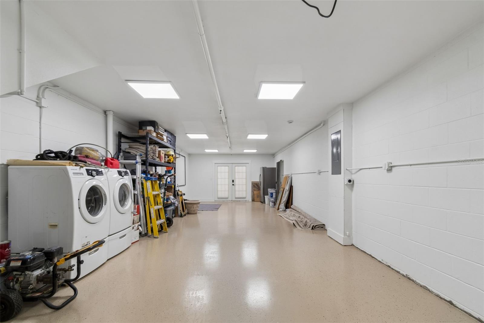 Oversized Garage-Caoted Epoxy flooring and EV plug ready