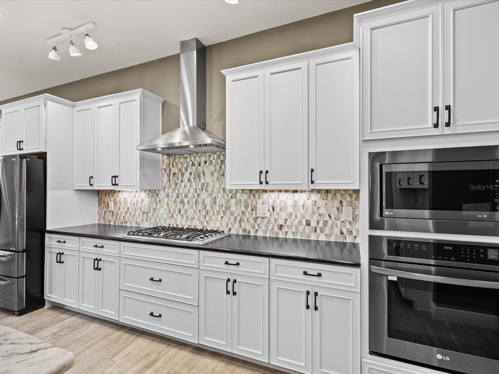 Kitchen cabinets feature convenient roll-out racks and additional smart storage solutions