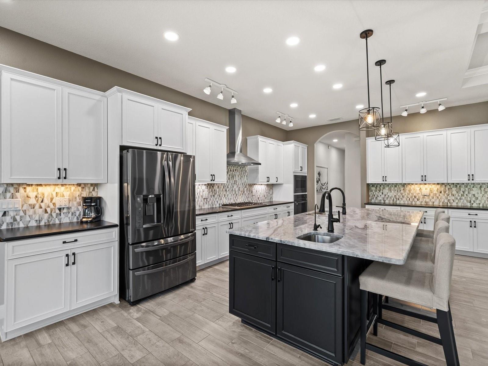 The kitchen at 11981 Robina Road is one you’ll remember long after your tour