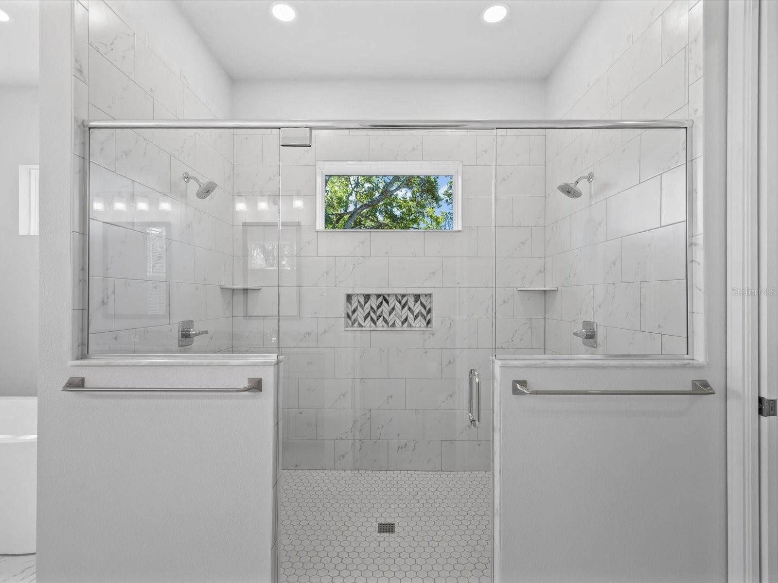 A luxurious zero-entry walk-in shower designed for comfort and ease