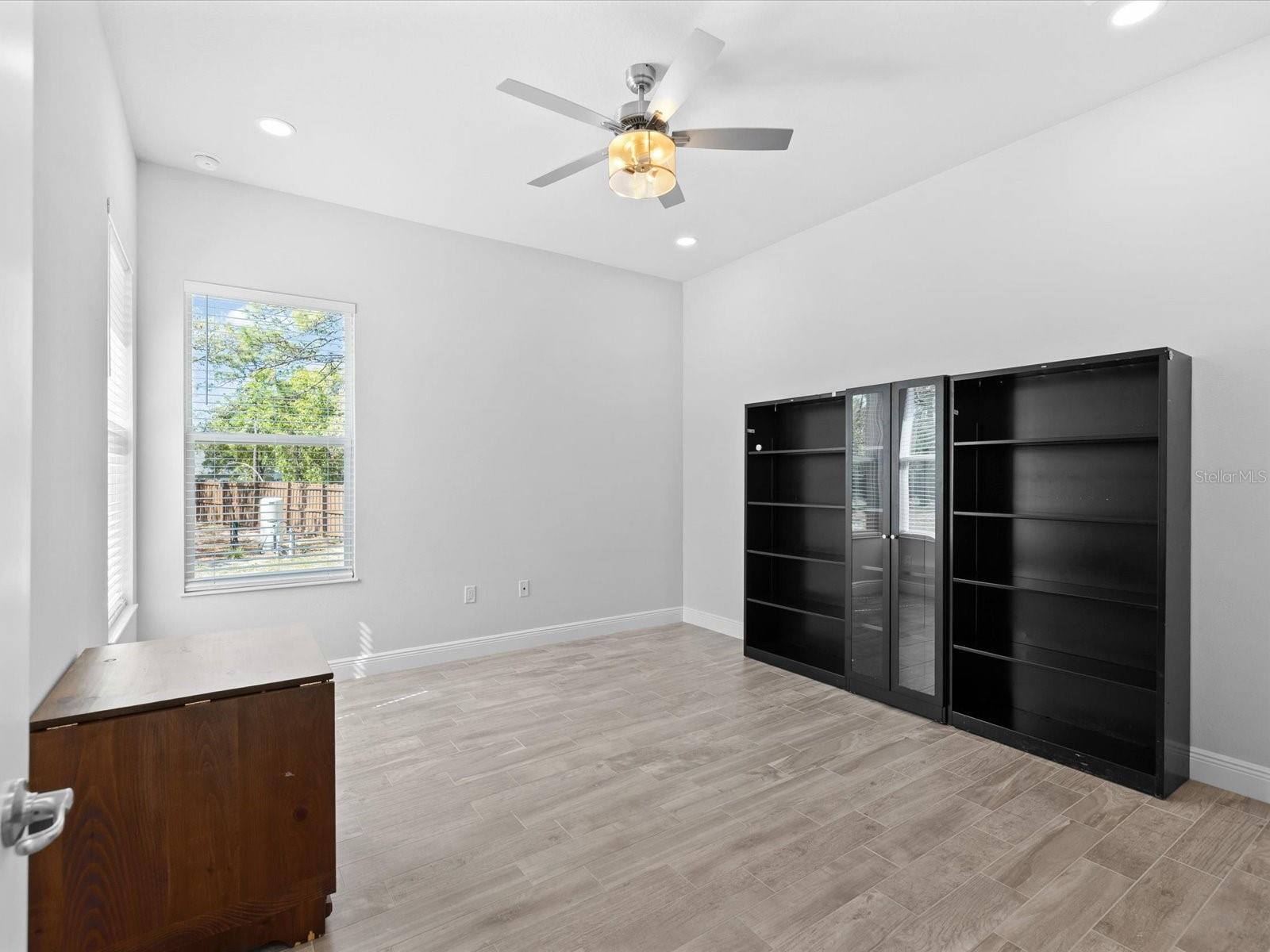 Bedroom 3 offers a generously sized closet and spectacular views overlooking the rear yard