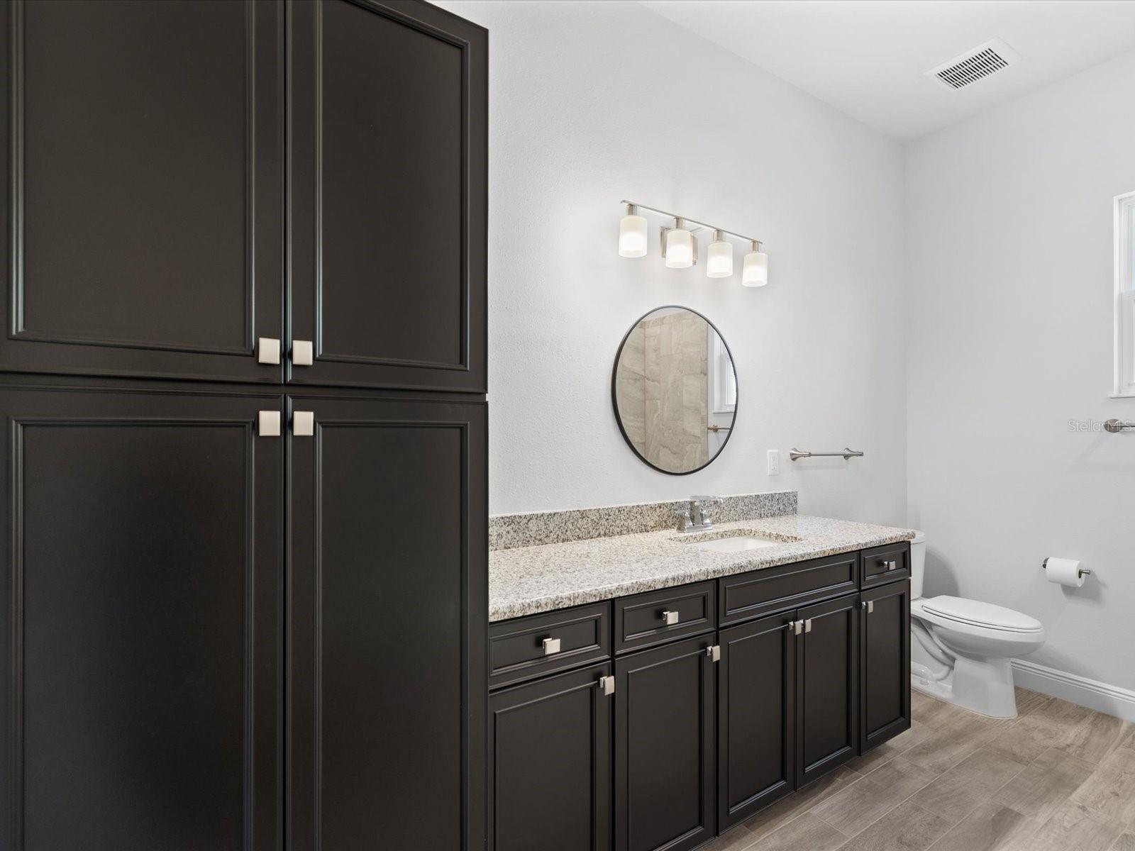 Bedroom five offers a private en-suite bathroom, ideal for guests or multigenerational living