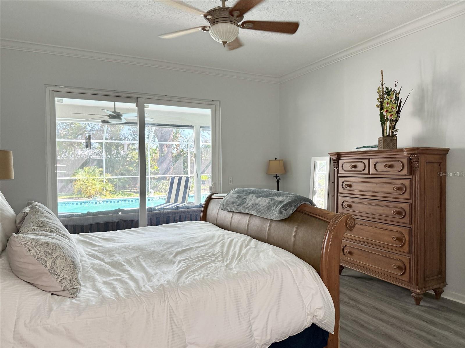 Primary Bedroom - Sliders Open to Covered Outdoor Patio