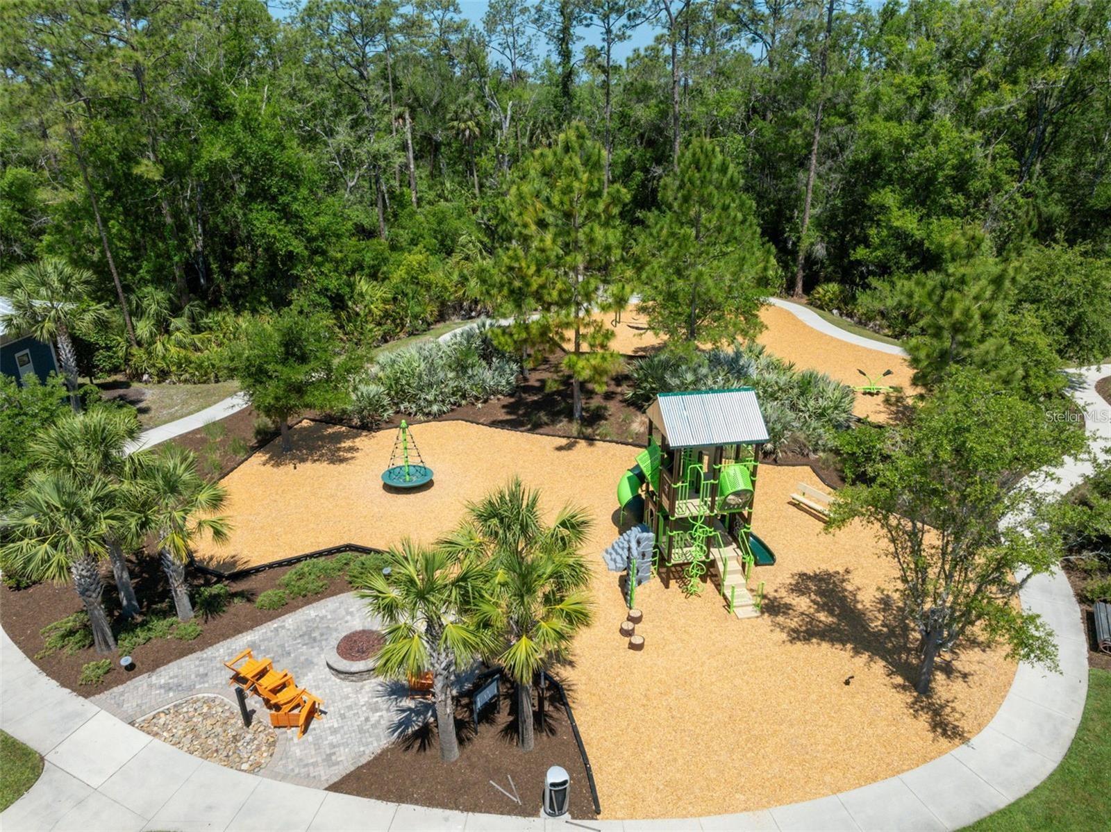 Fire pit & playground at clubhouse playground
