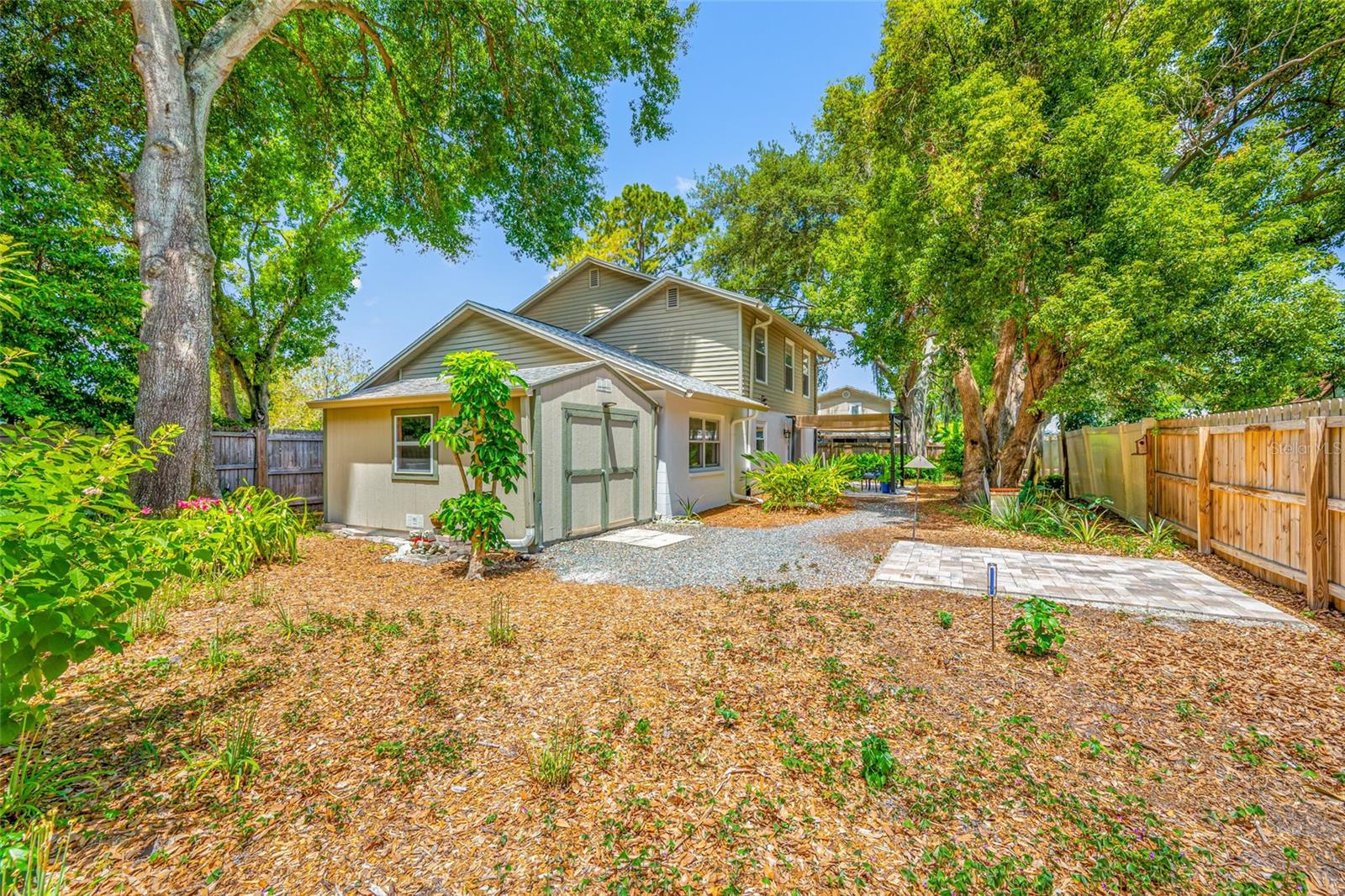 Shed and large fenced backyard