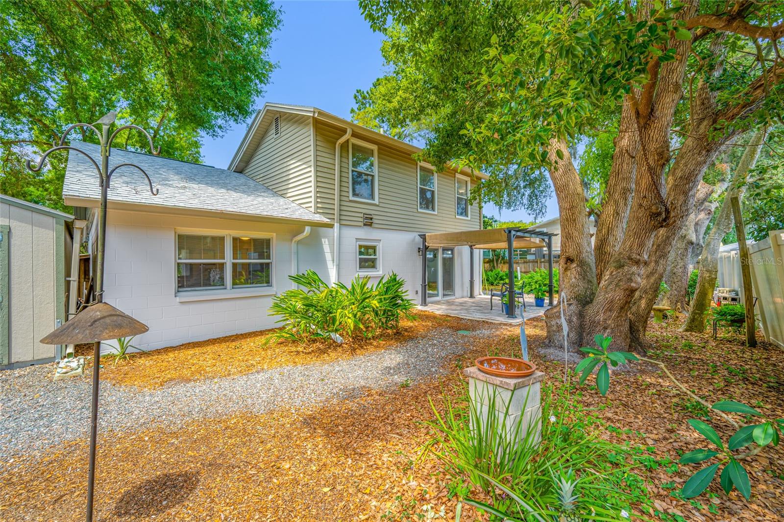 Large fenced back yard and back patio