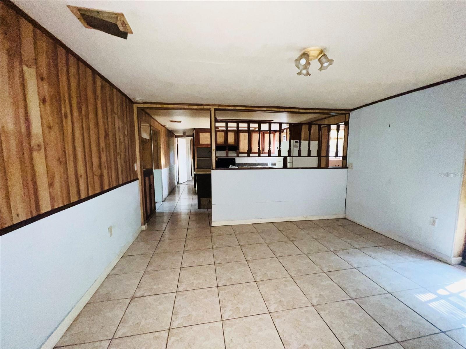 FAMILY ROOM LOOKING OUT TO KITCHEN