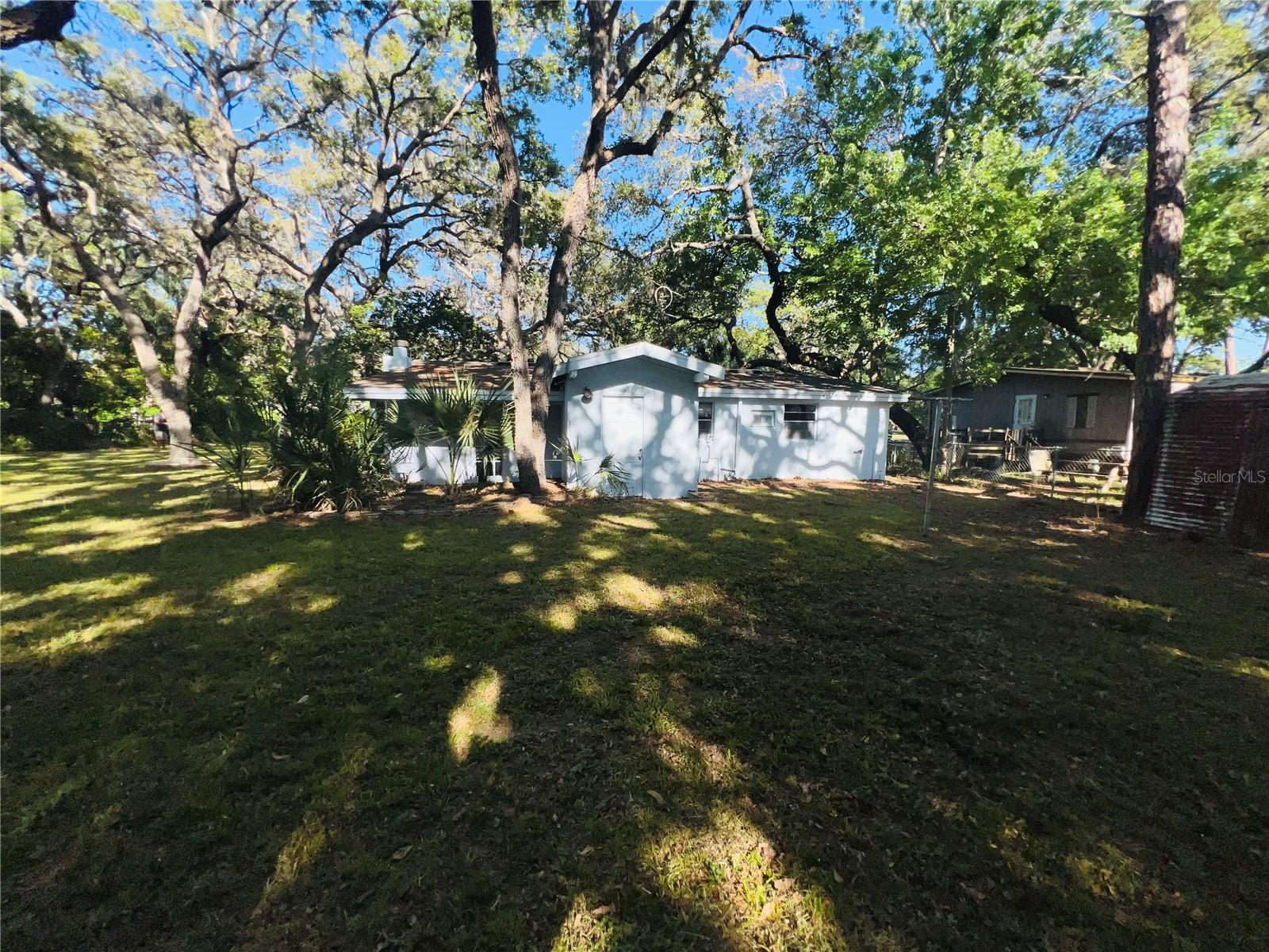 BACL YARD AND BACK OF HOUSE