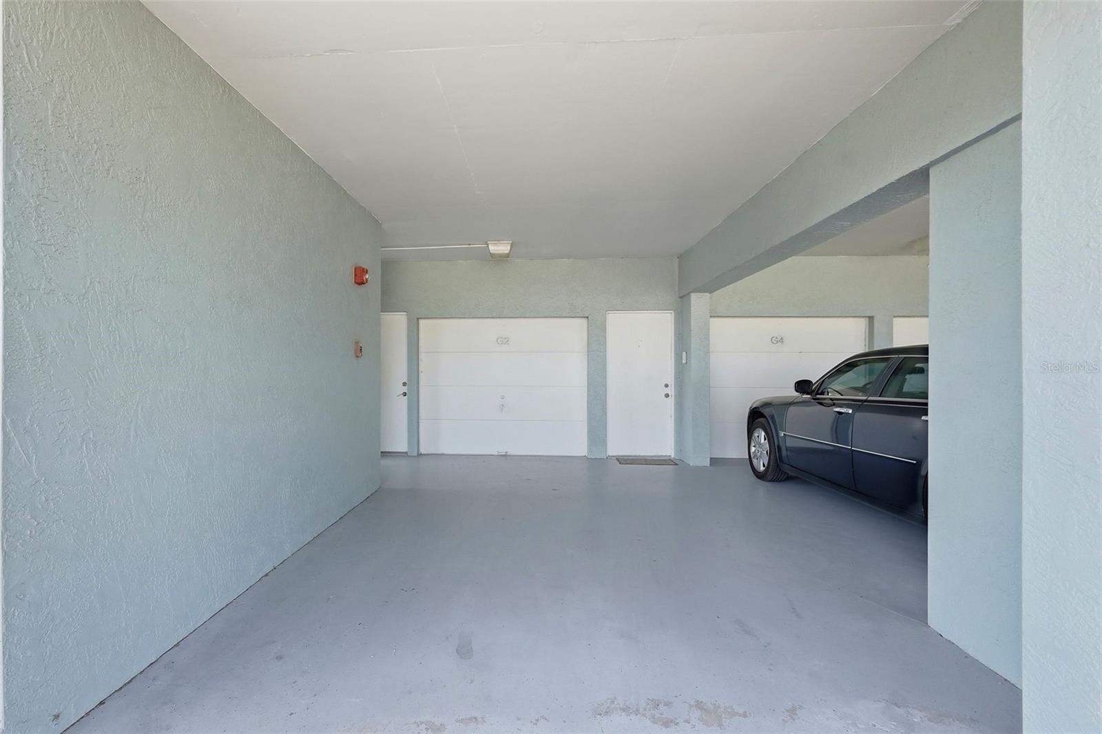 Garage with covered carport and air conditioned bonus space.