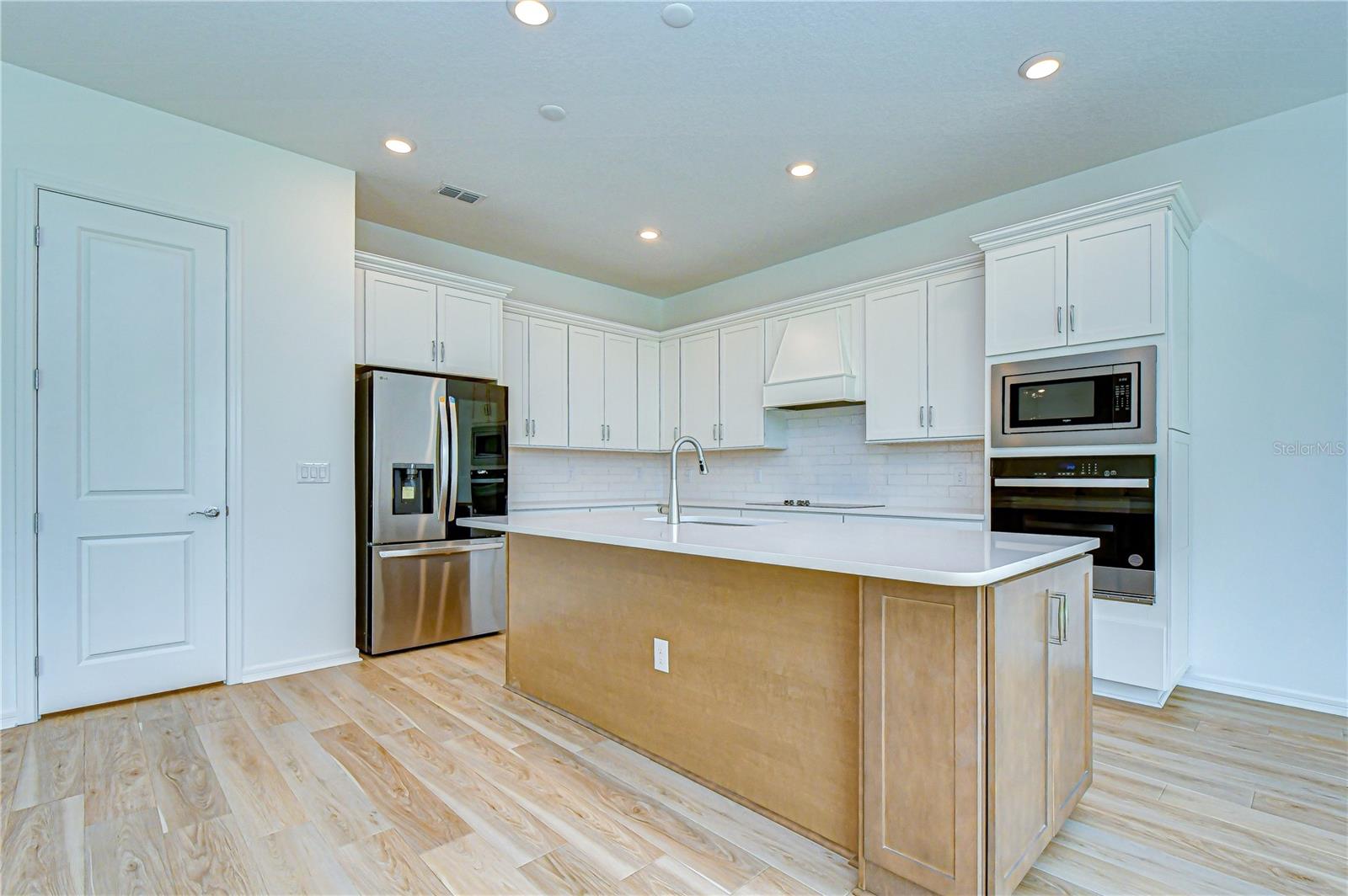 White cabinetry with modern finishes