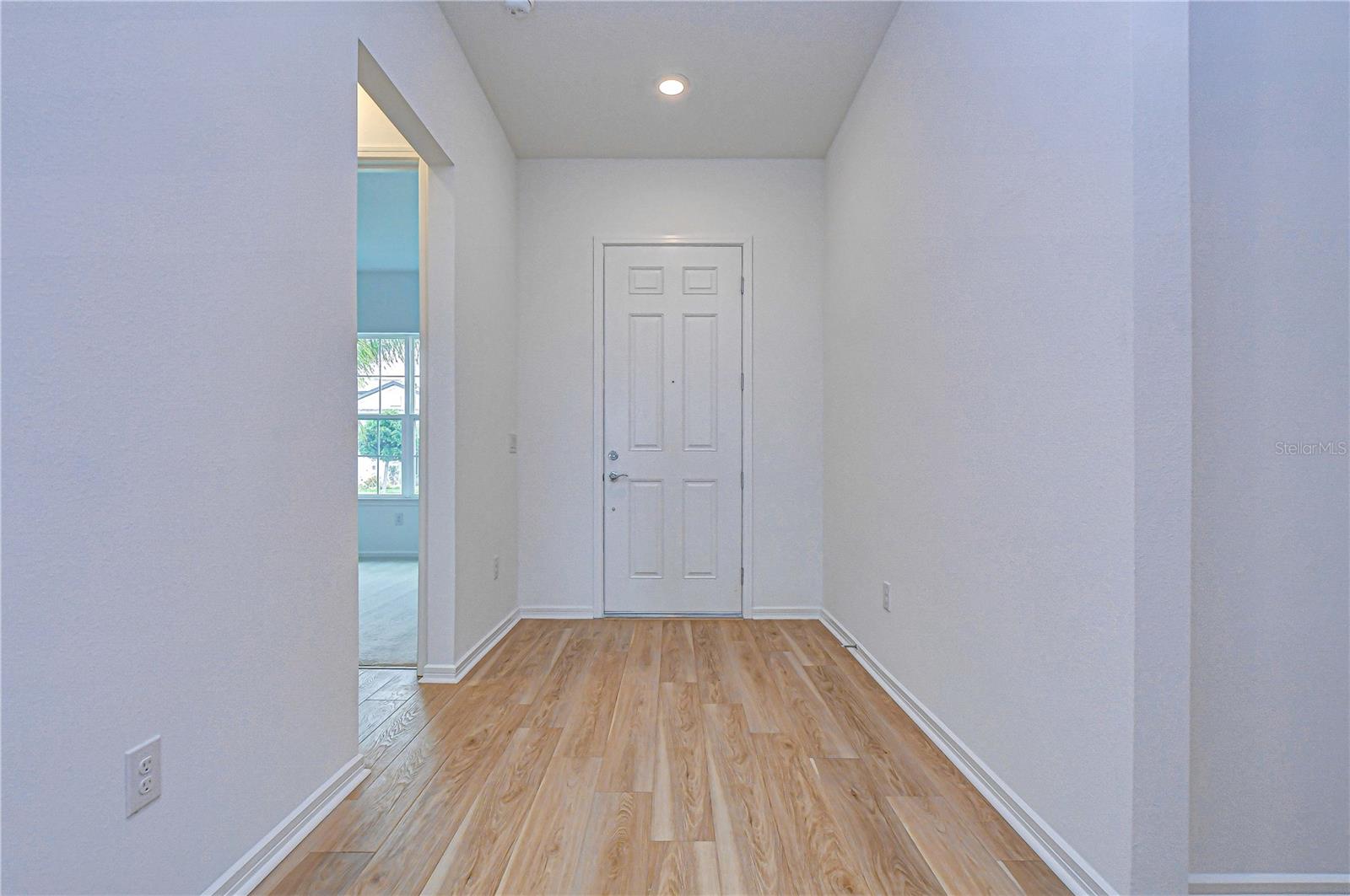Bright entry with 8-foot interior doors and natural light