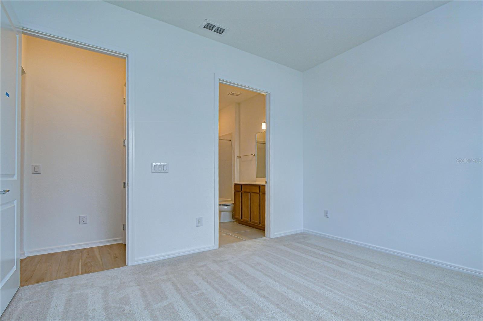 Beautiful owner's suite with access to en-suite bathroom.