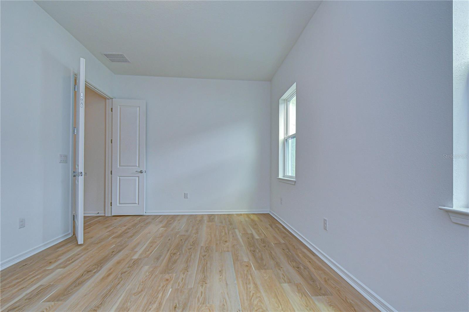 8-foot doors and modern finishes throughout