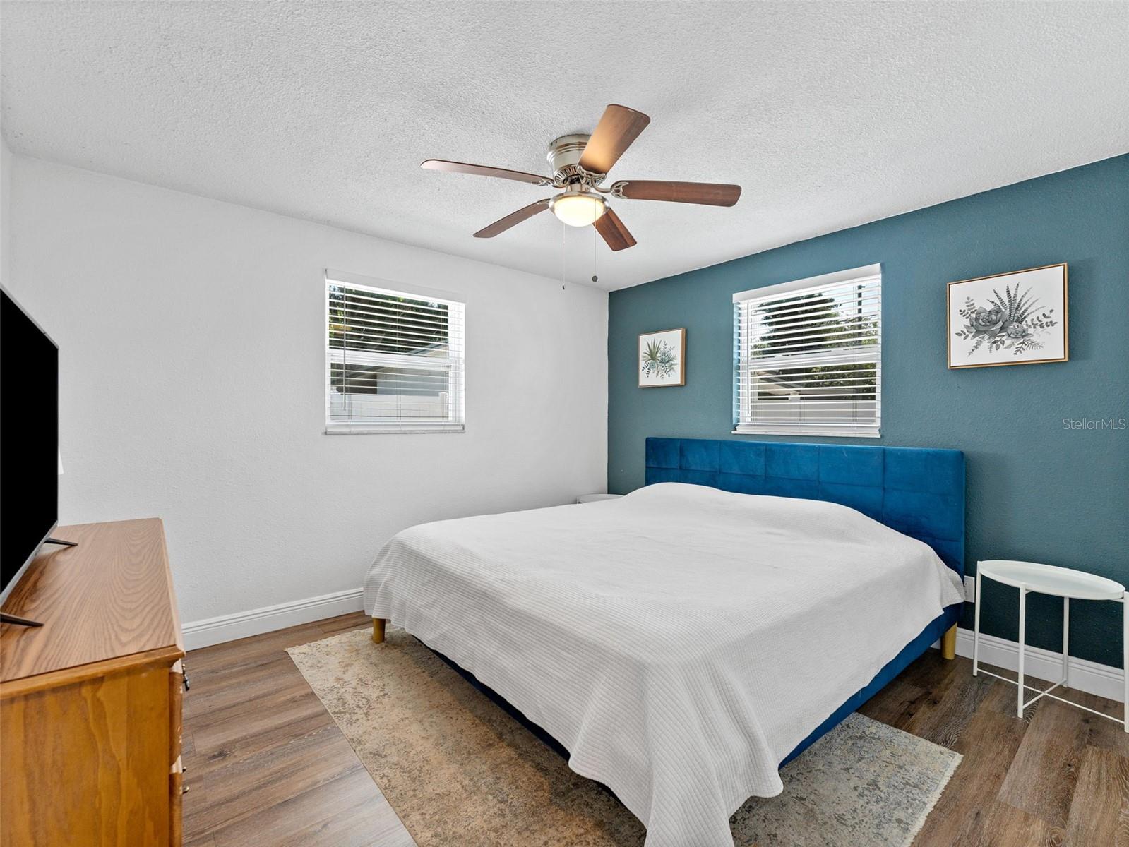 Primary bedroom with abundant natural lighting
