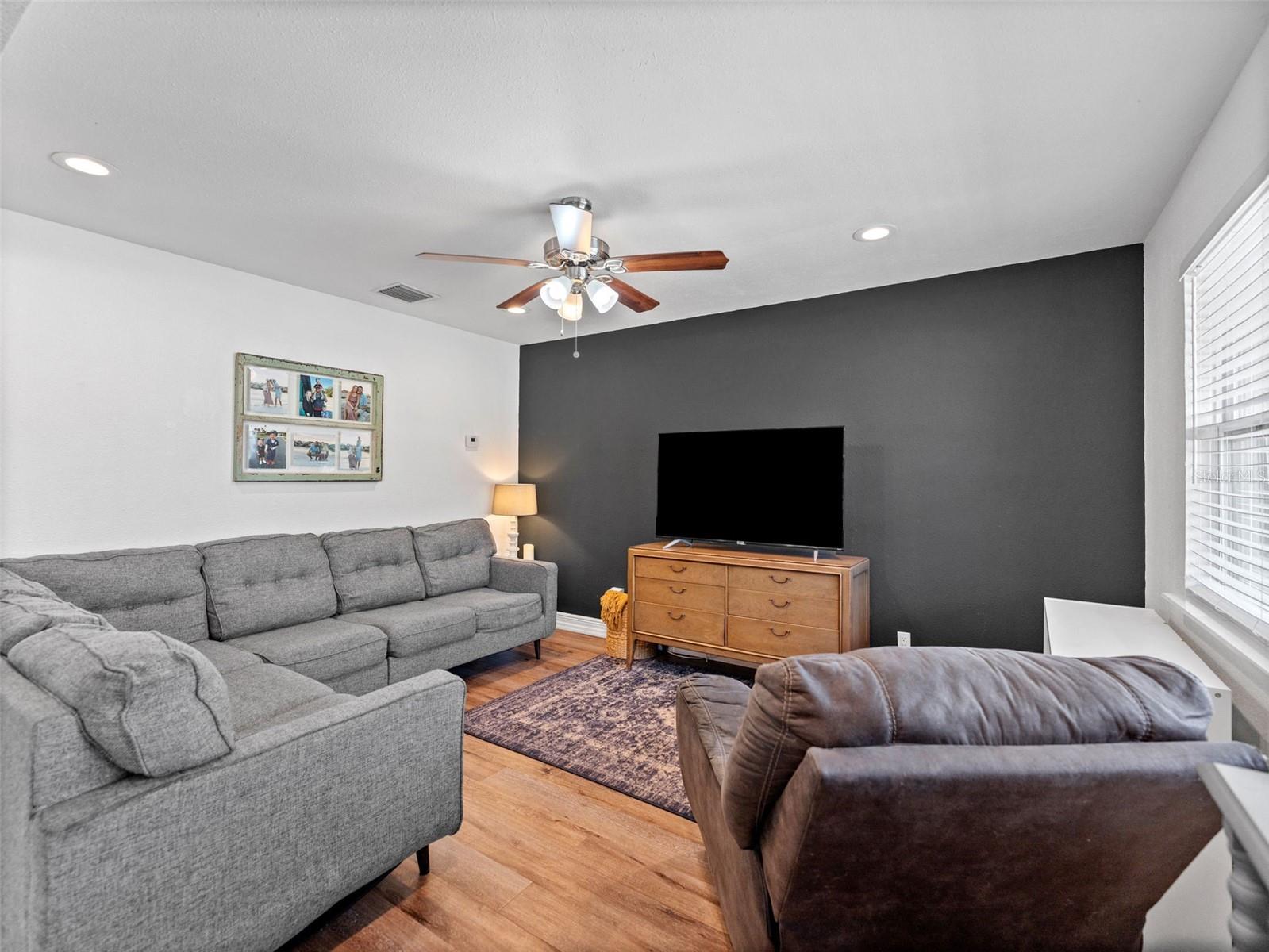 Living room is well appointed with space for all your furniture