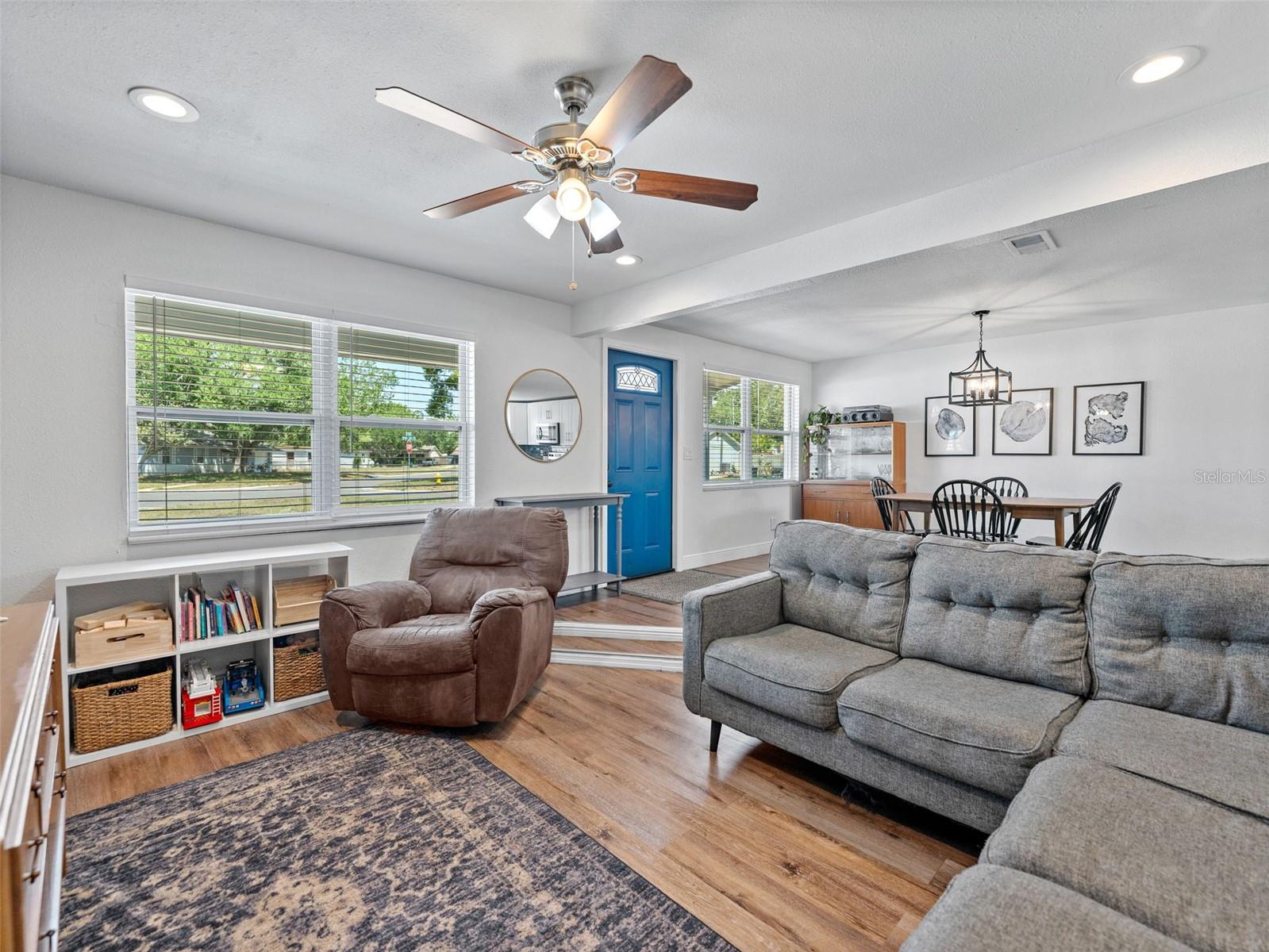 Living room has a step down making it a cozy and comfortable space to relax or entertain