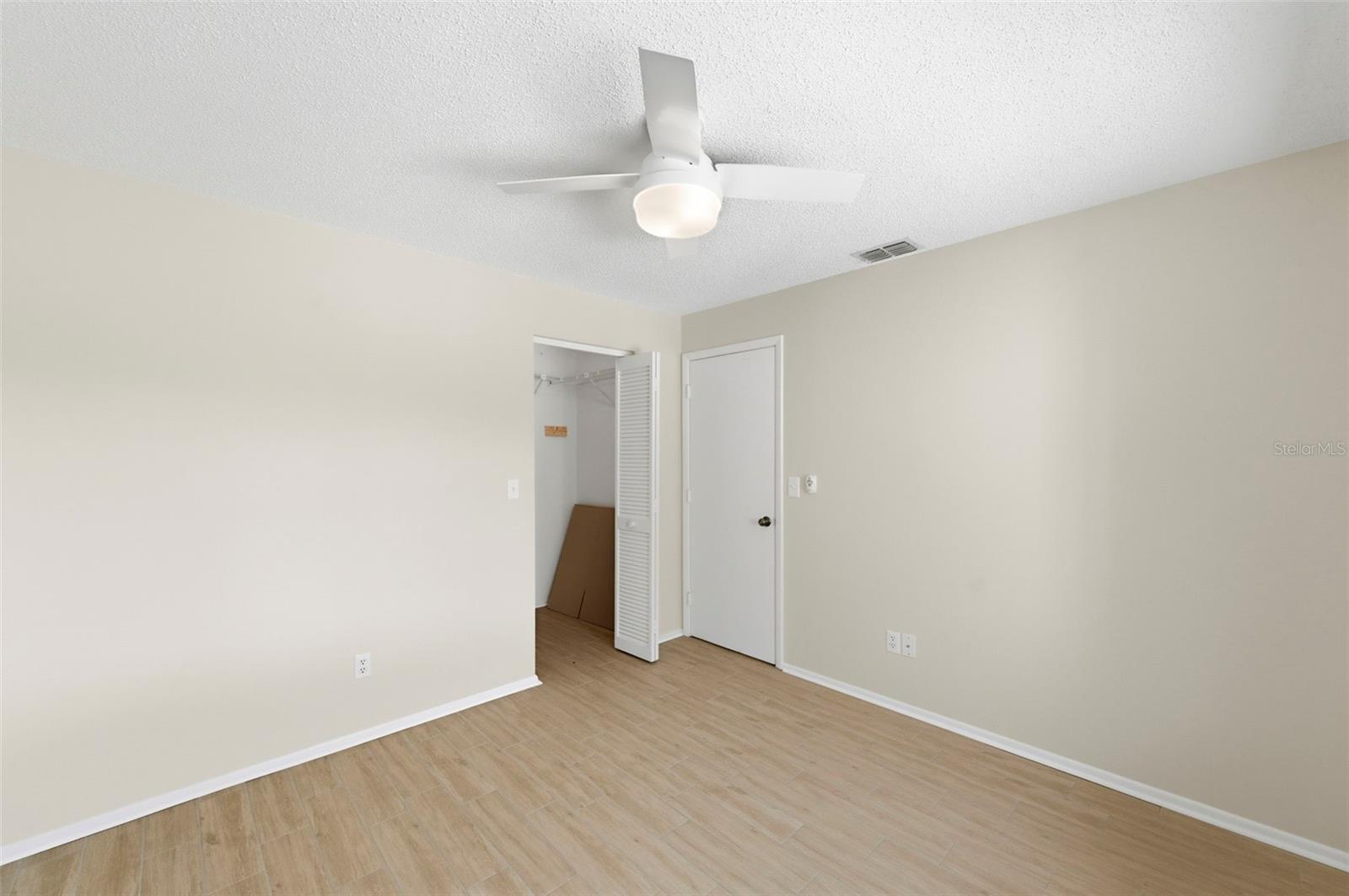 Guest Bedroom with walk in closet