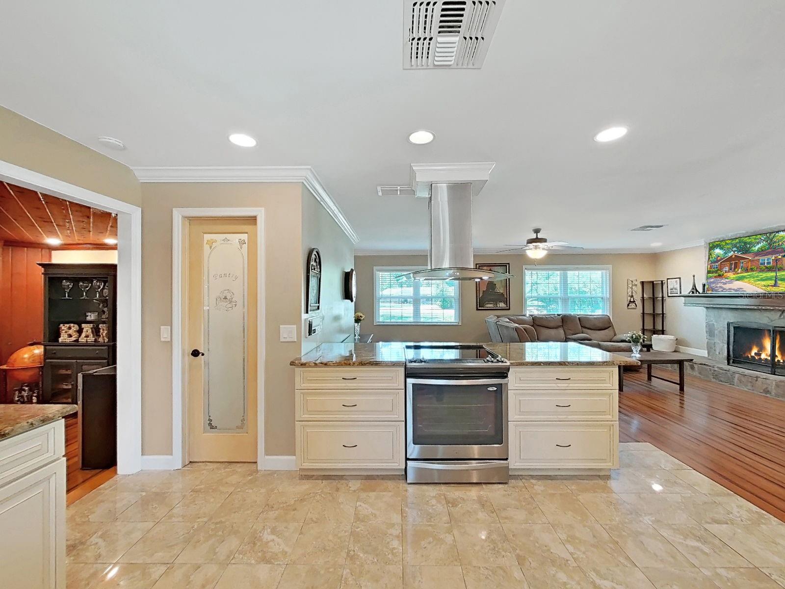 Kitchen with walk-in closet pantry, offering views into most all living areas from here! This home was built for comfort & fully enjoying everyday living!