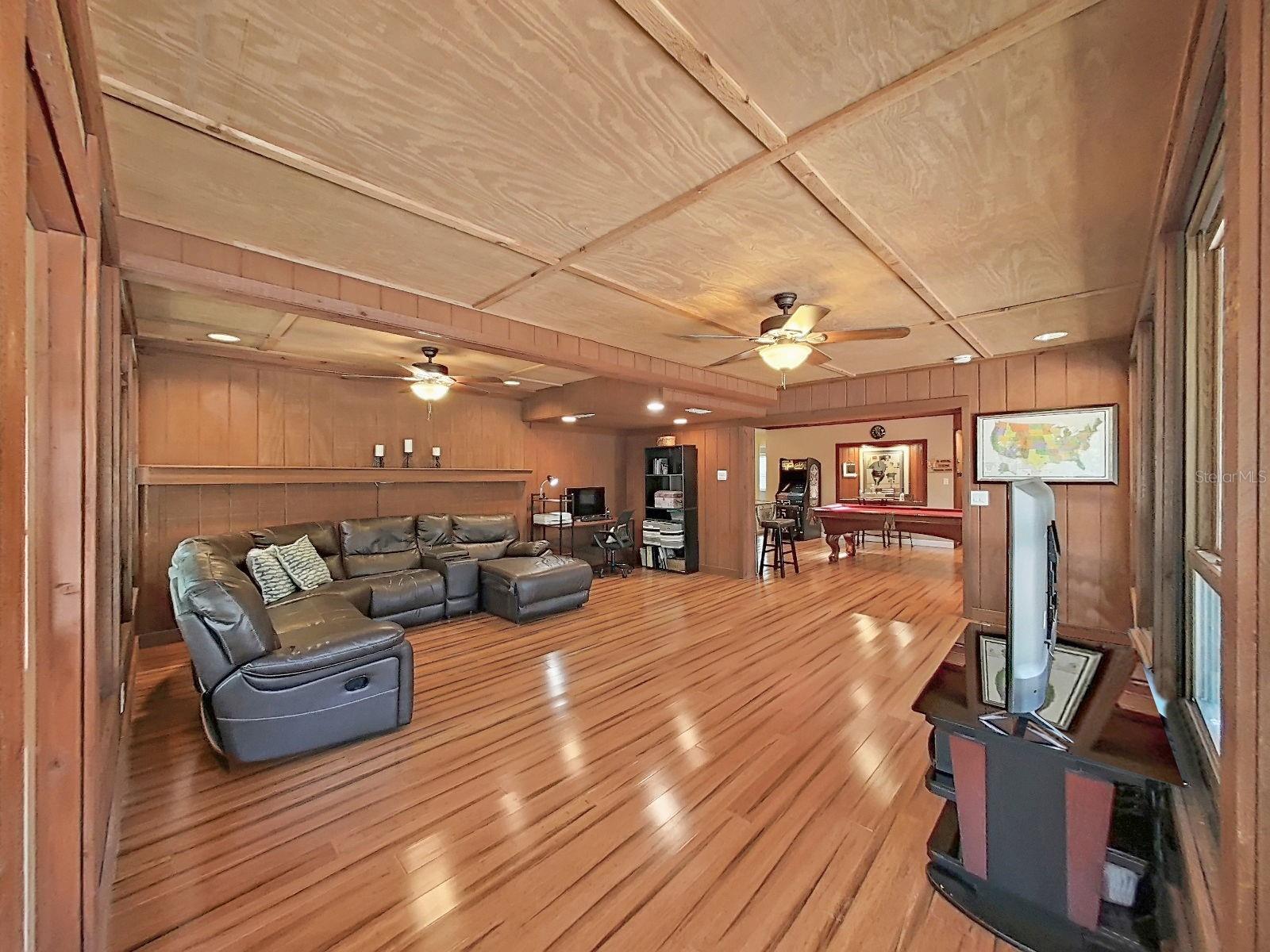 Massive Florida Family Room with open flow into the Bonus Game Room.