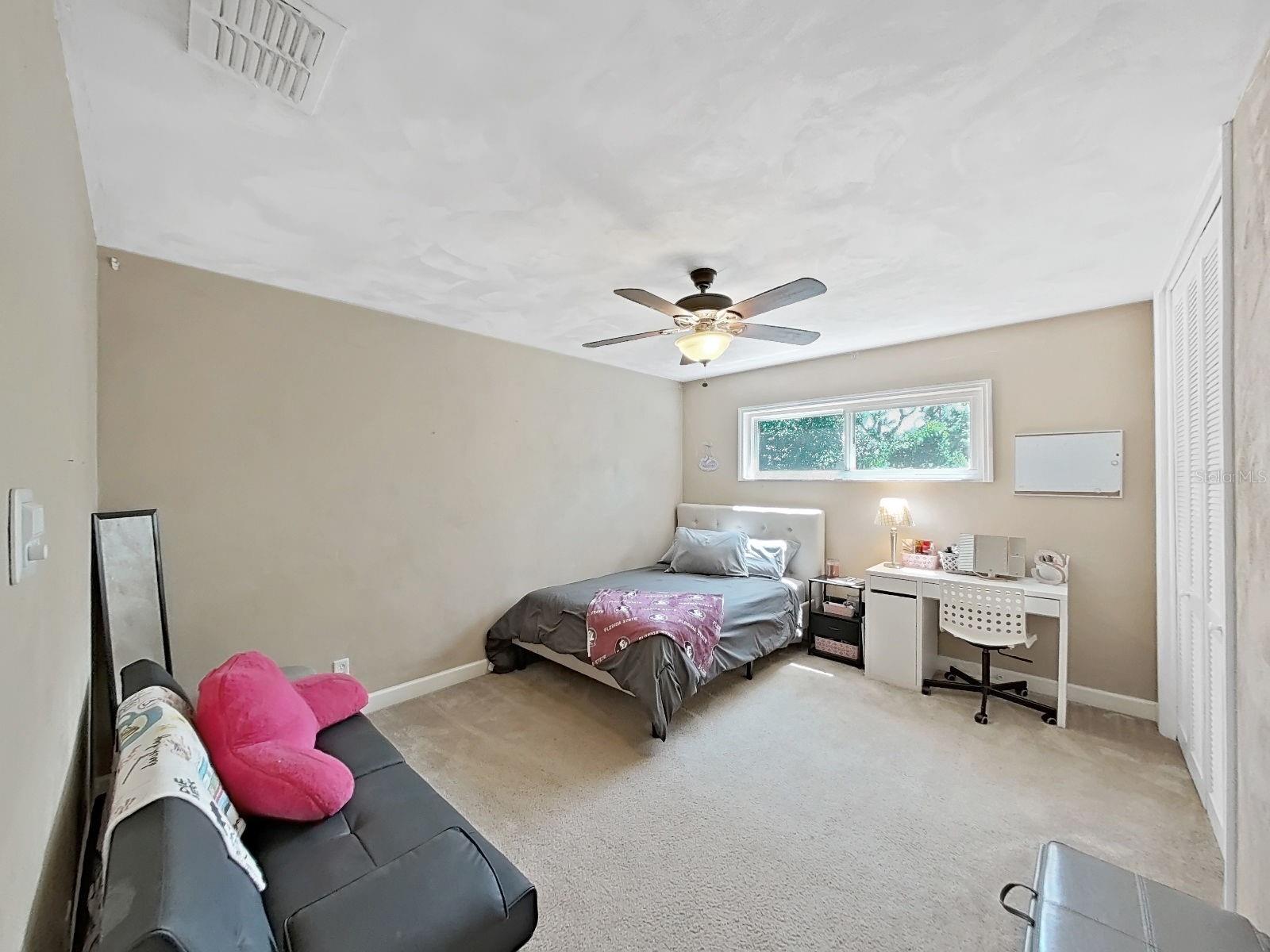 Bedroom 2- Large in size with room for plenty of furniture. Neutral tones!