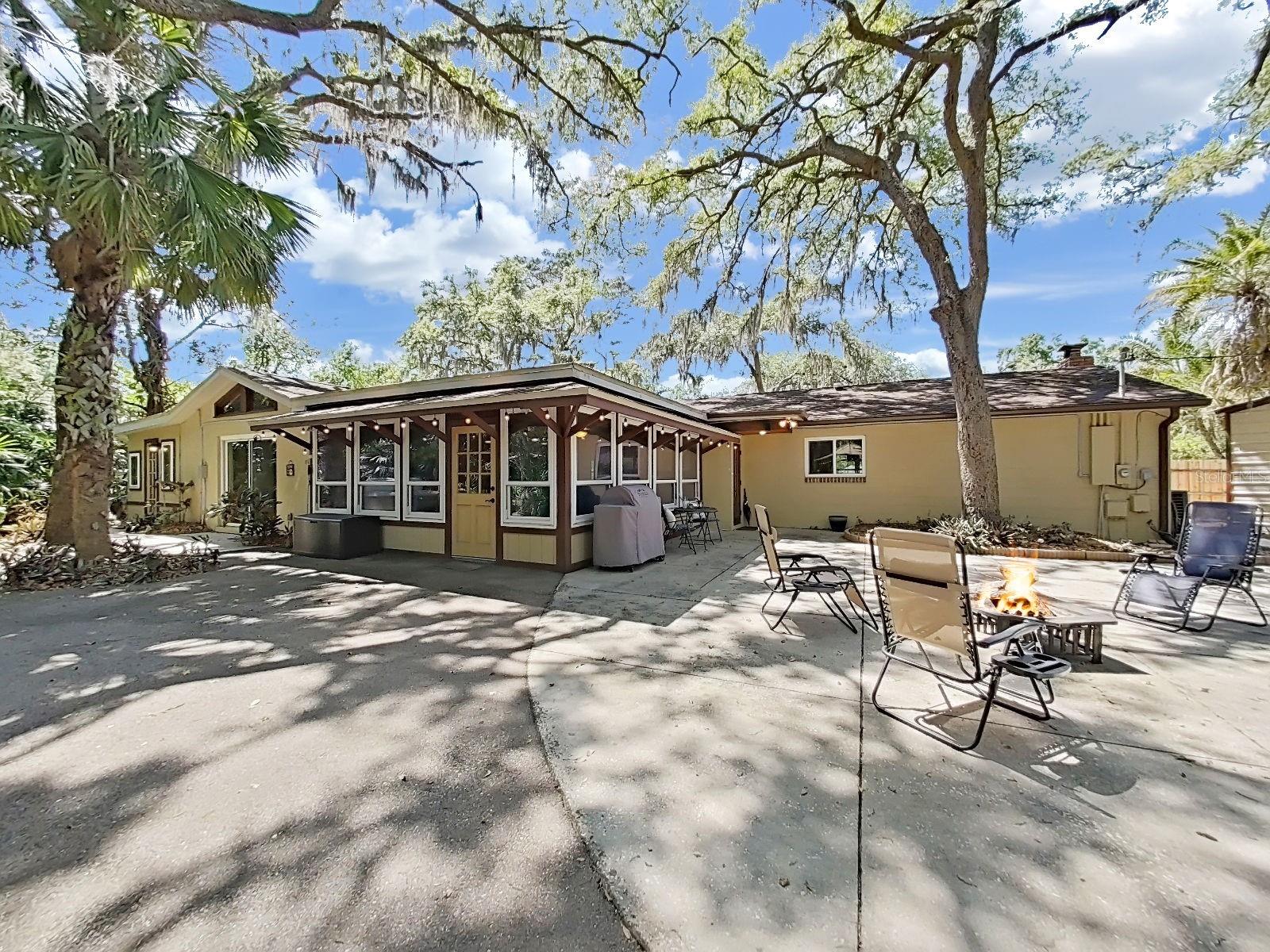 Expansive back exterior, showcasing the home's meticulous care and appeal.