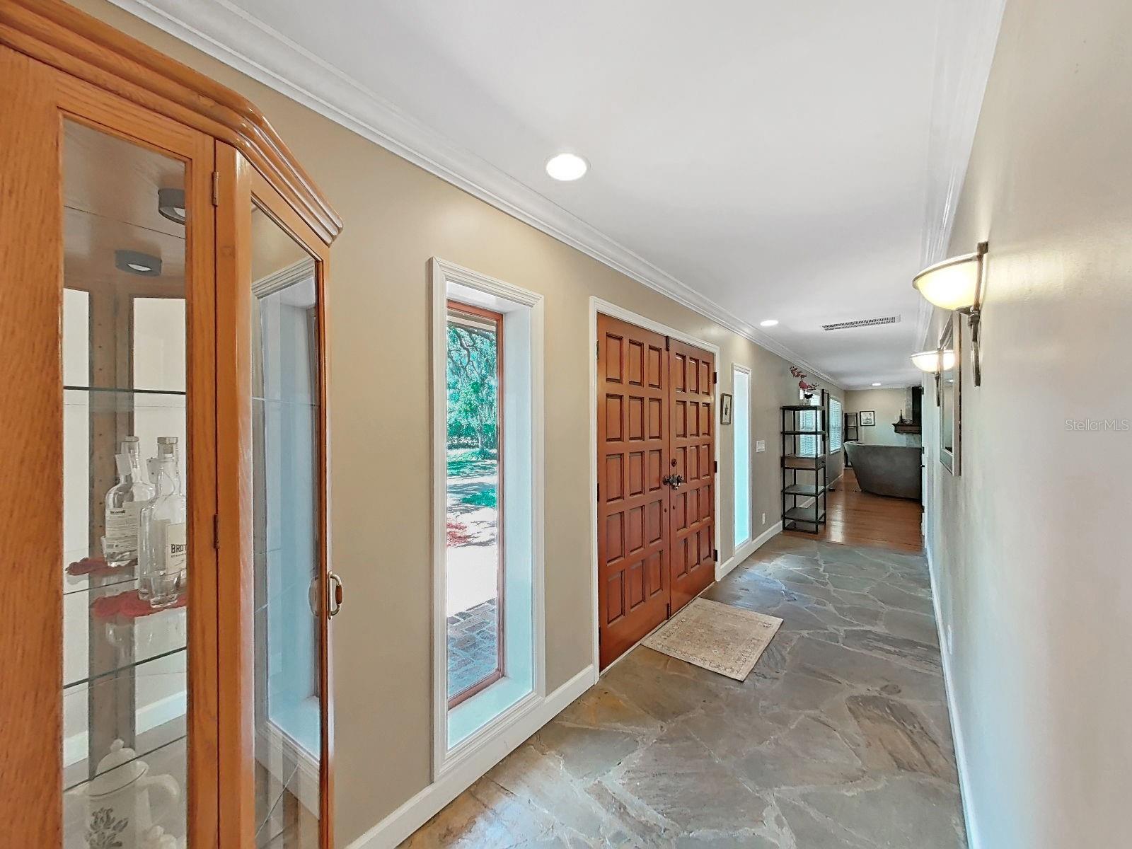 Spacious entry welcomes you in, leading to the heart of the home!