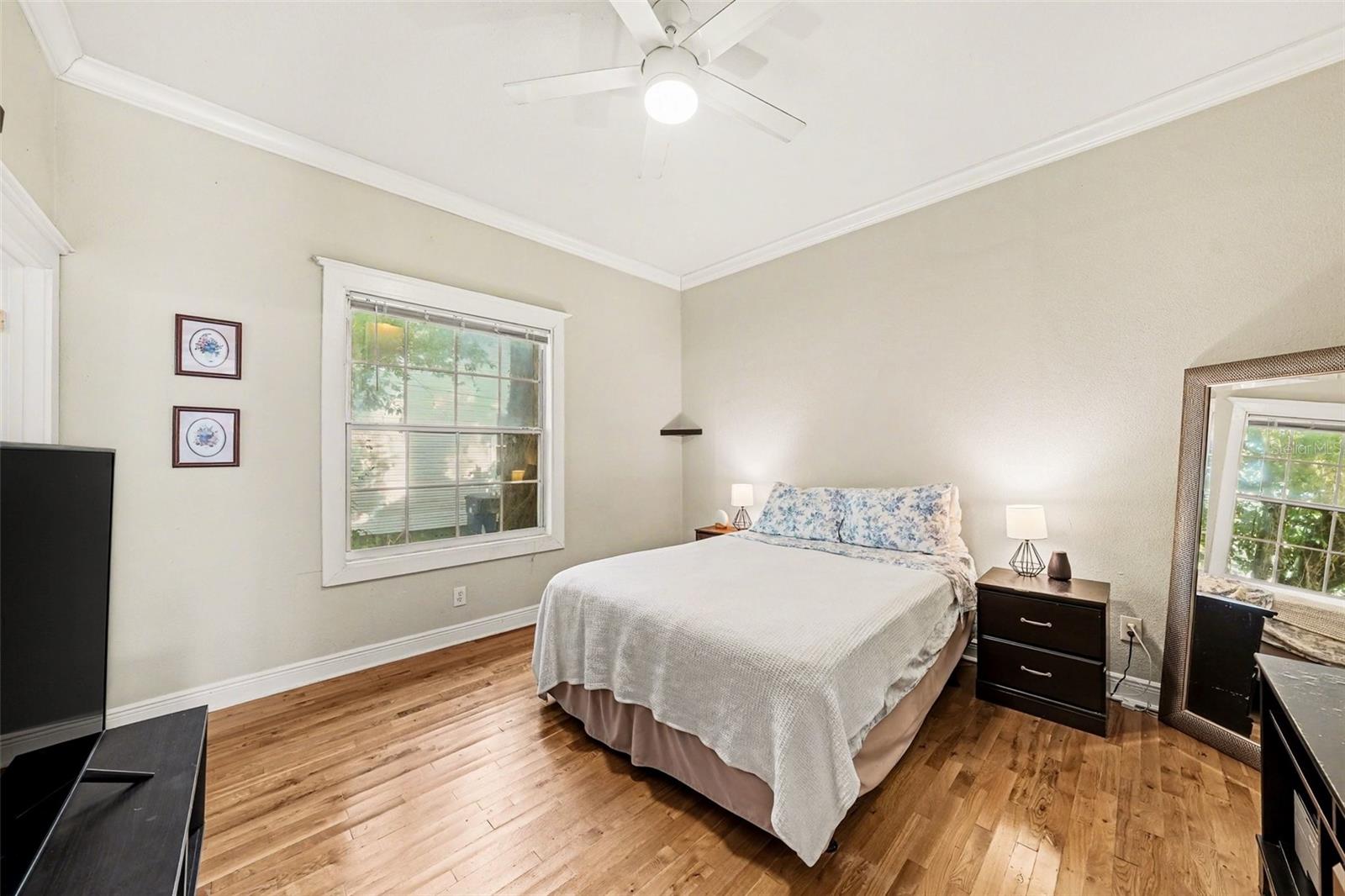 Primary bedroom with comfortable layout and natural light.