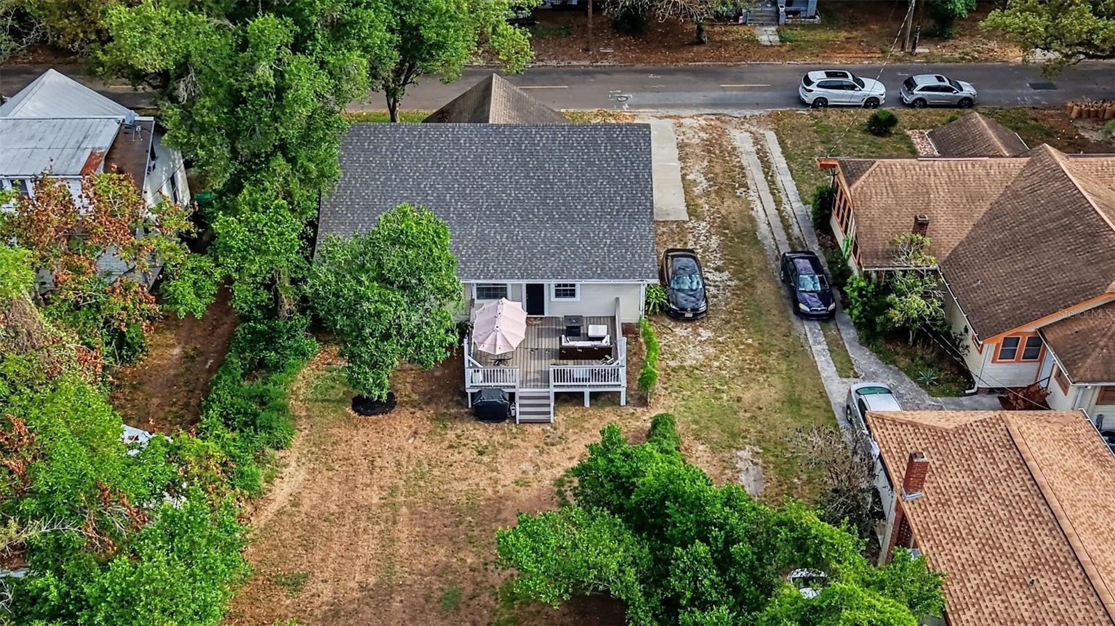 Aerial view showing lot size and surrounding neighborhood.