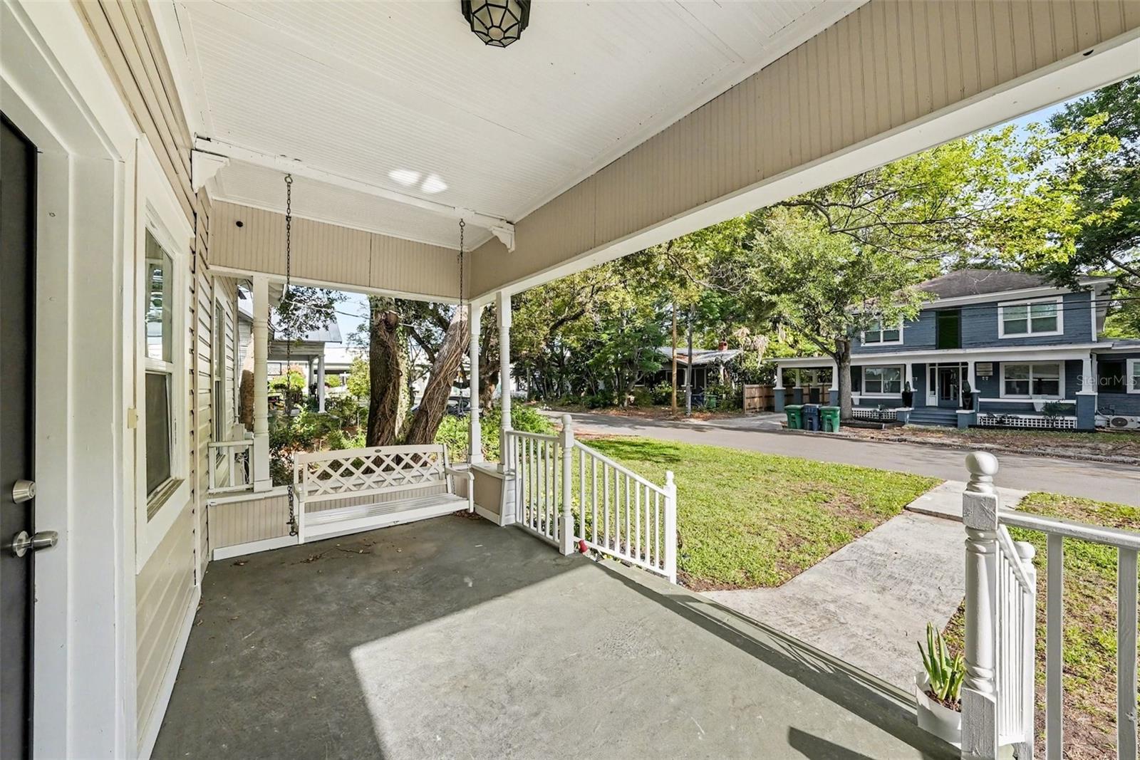Welcoming front porch, perfect for morning coffee or evening relaxation.