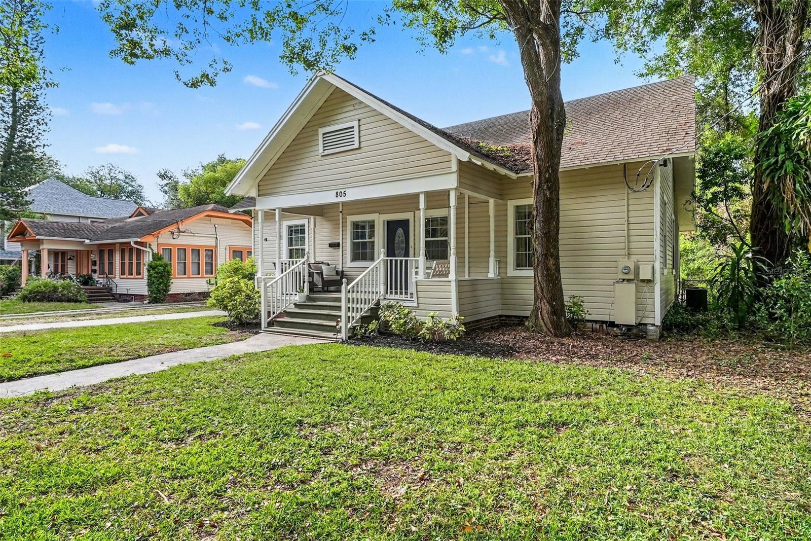 Alternate exterior angle showcasing the home’s setting and curb appeal.