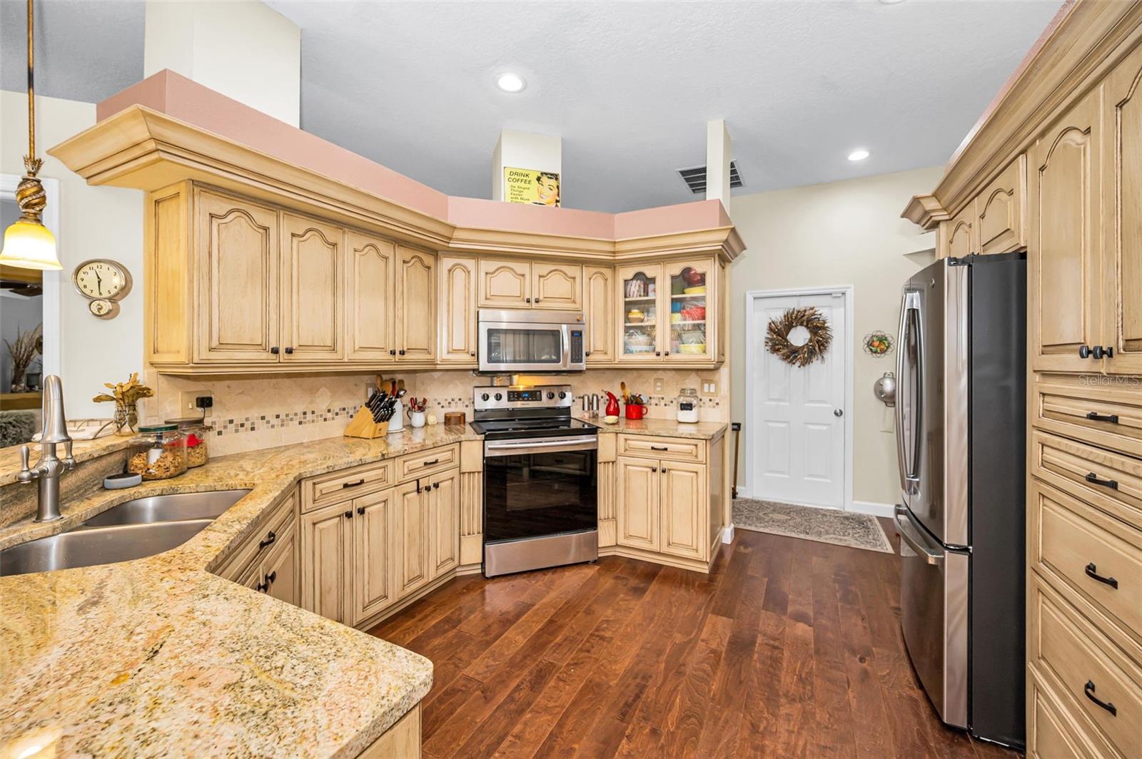 Stainless Steel Appliances - tile backsplash