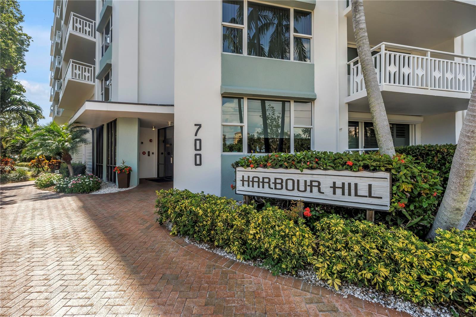 Front entry to building faces south