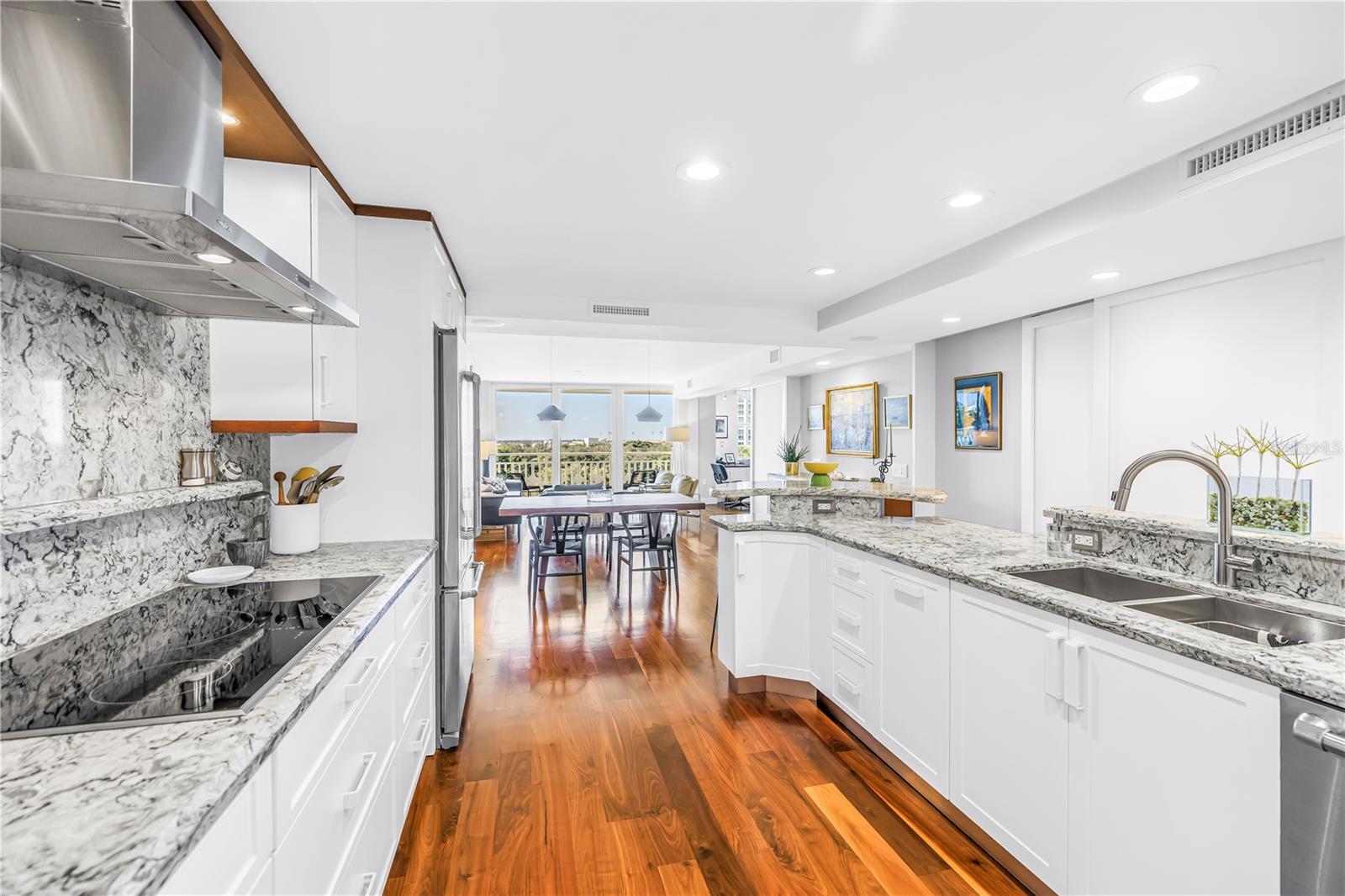 Kitchen looking into the dining and living area
