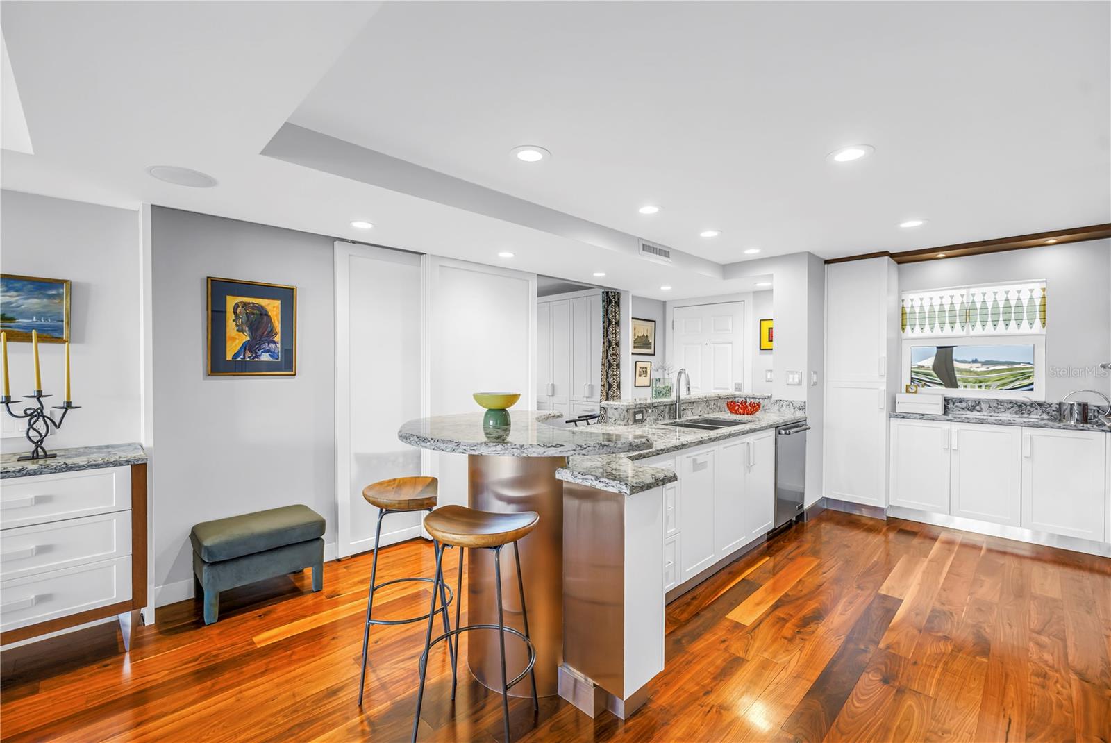 Kitchen sink and hightop breakfast bar.