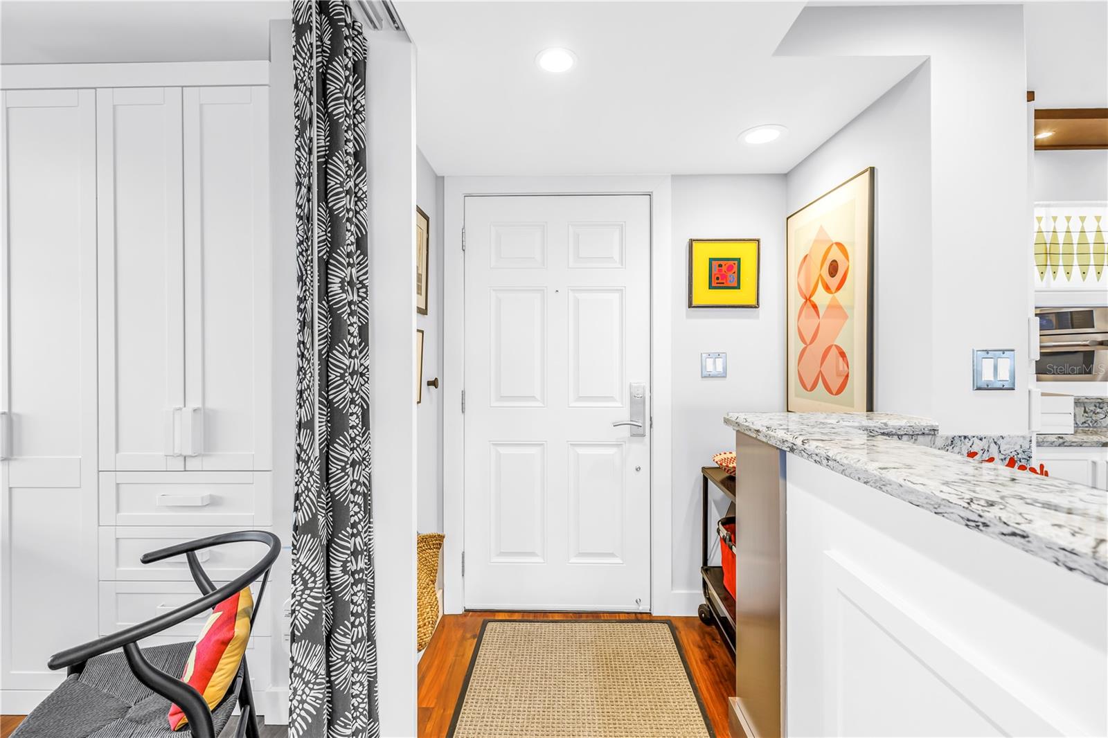 Front door and Primary Bedroom (left side)