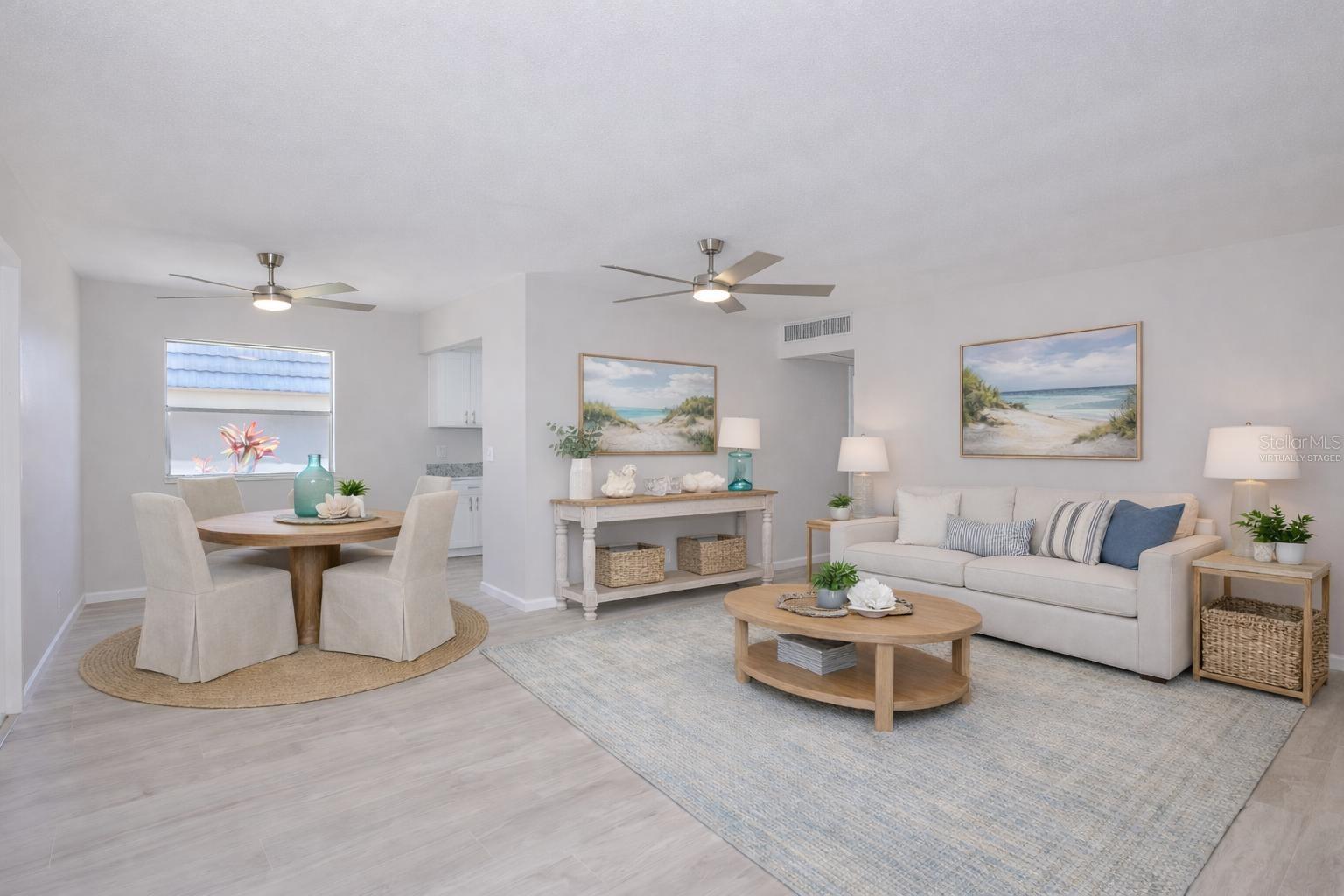 virtually staged Living room, dining area from another angle