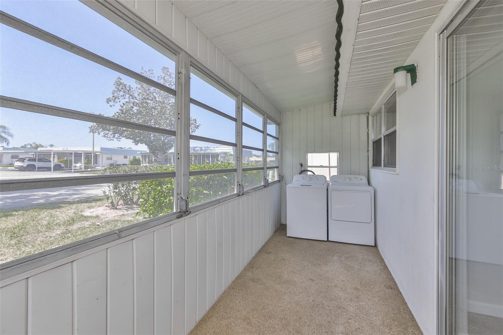 New washer and dryer in the enclosed lanai