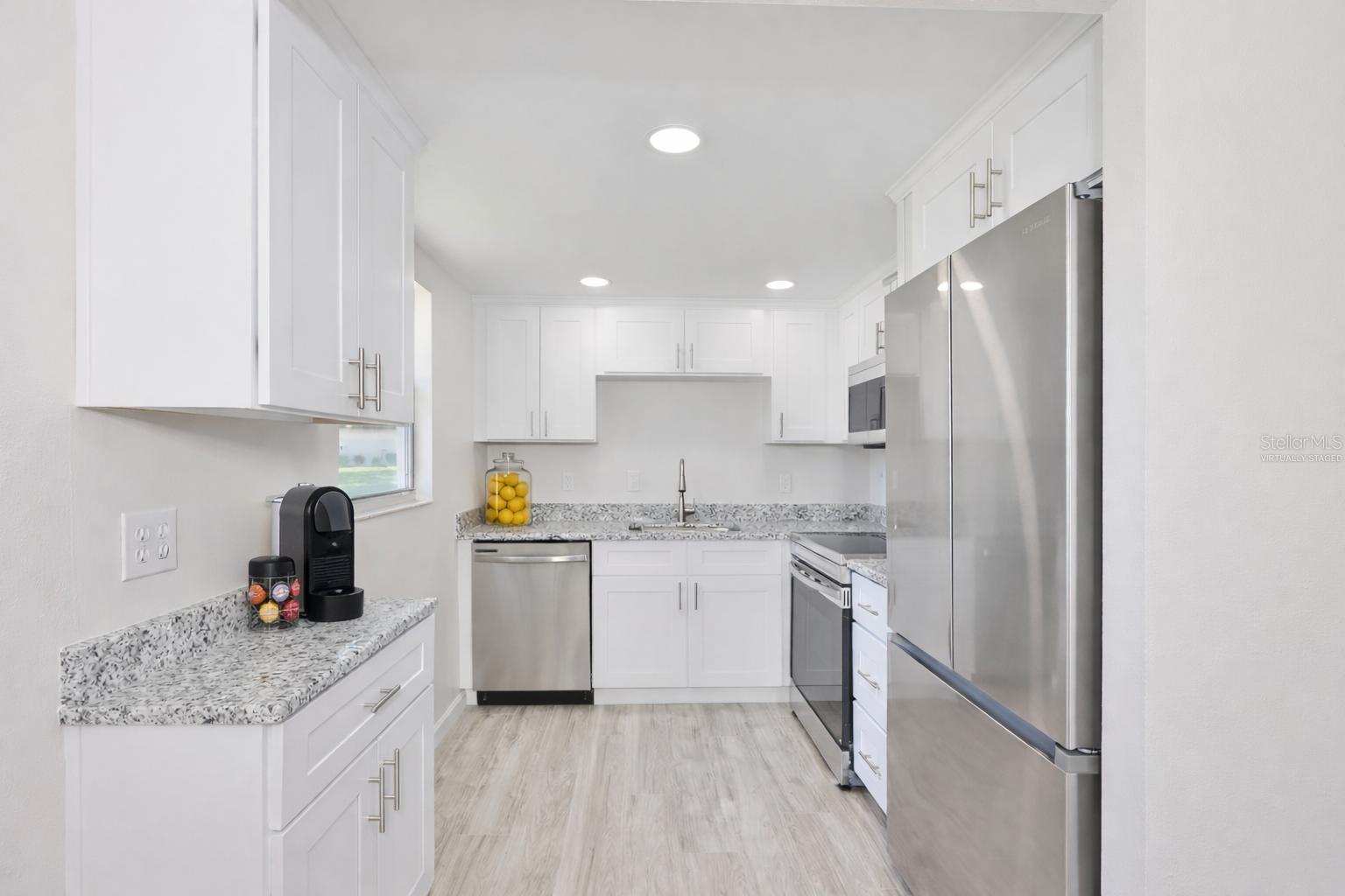 Stunning kitchen with some virtually staged items