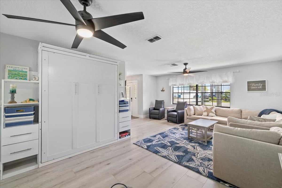 Day Bed in L shaped living room dining room