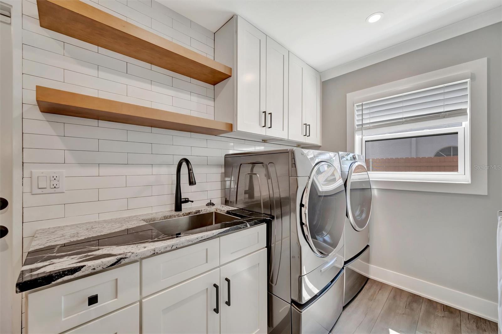 The laundry room located by the garage entrance