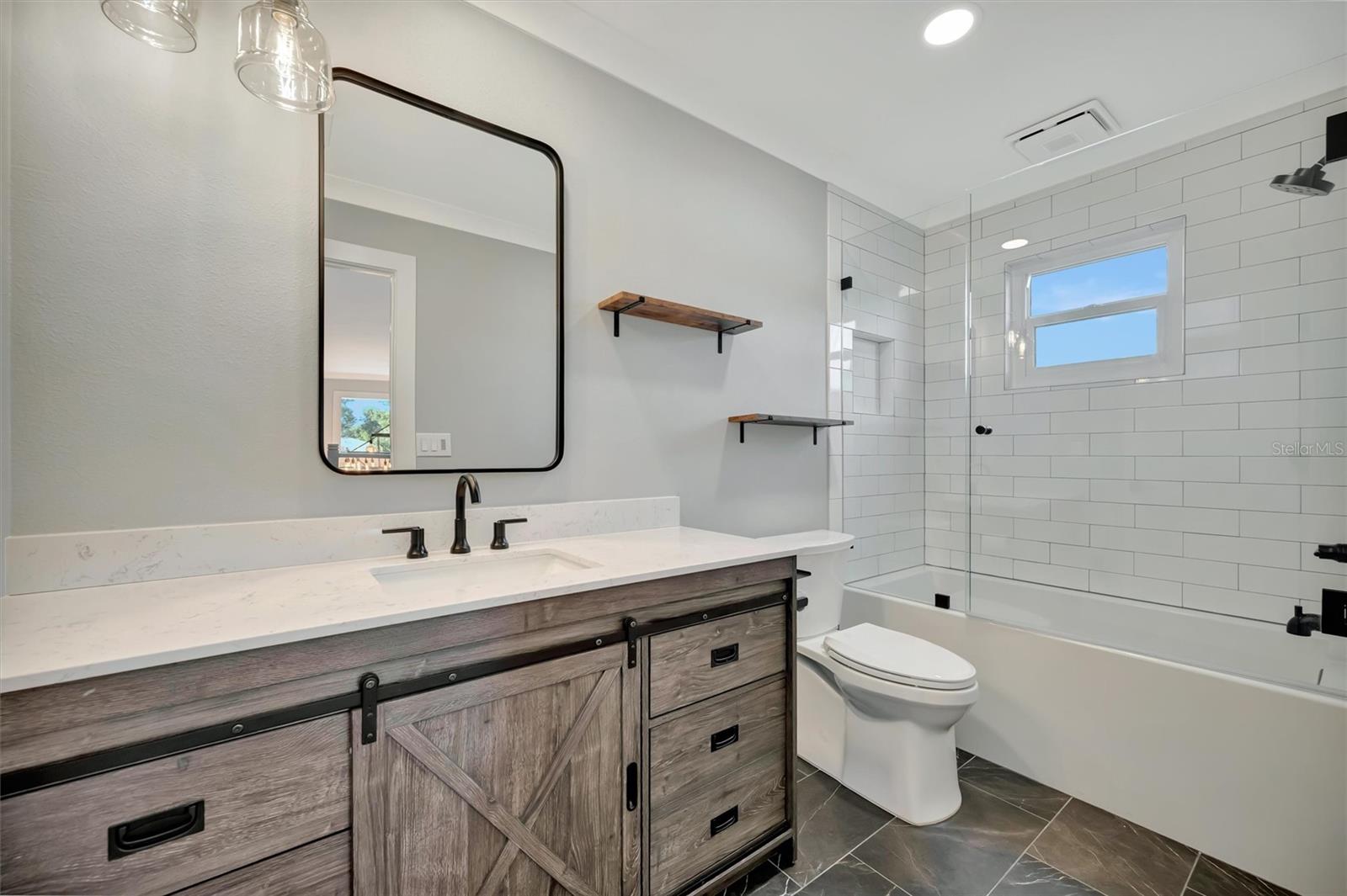 The guest bathroom upstairs in the hallway