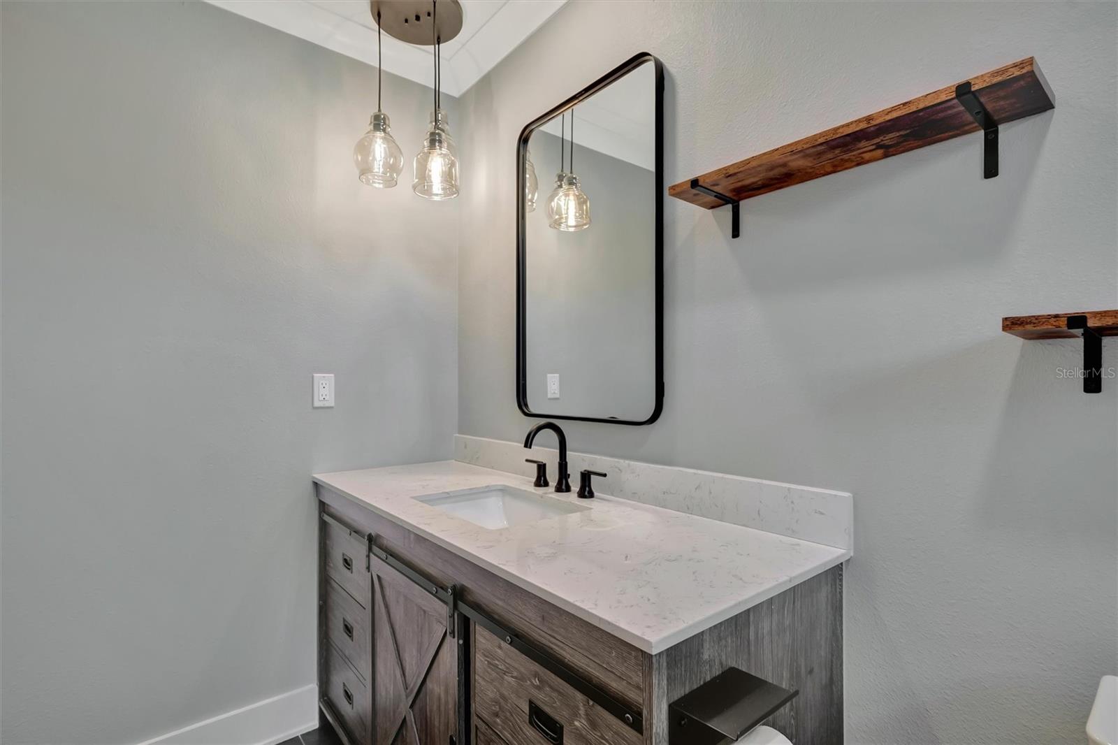 The guest bathroom upstairs in the hallway