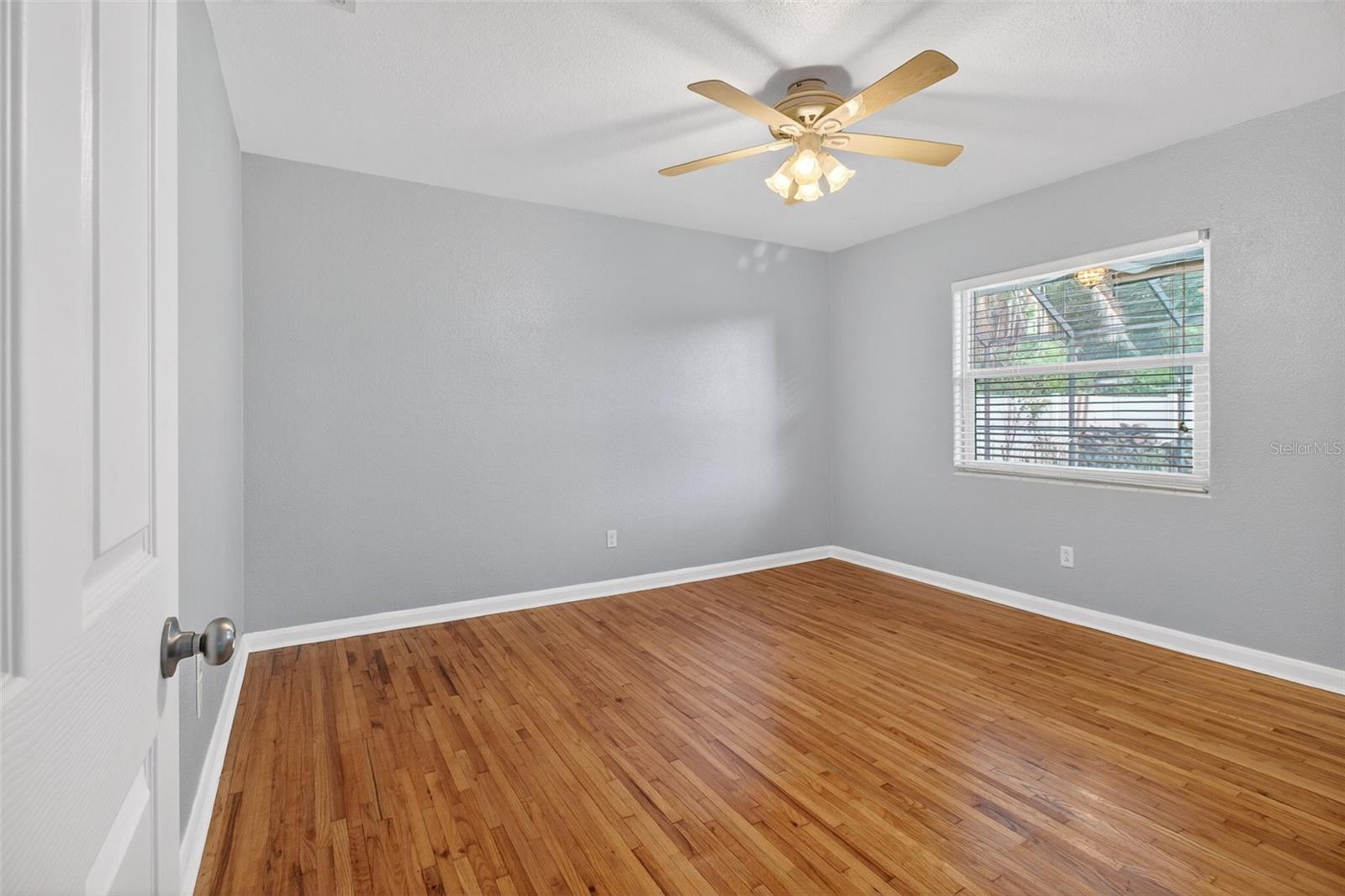 Bedroom 1 has hardwood floors