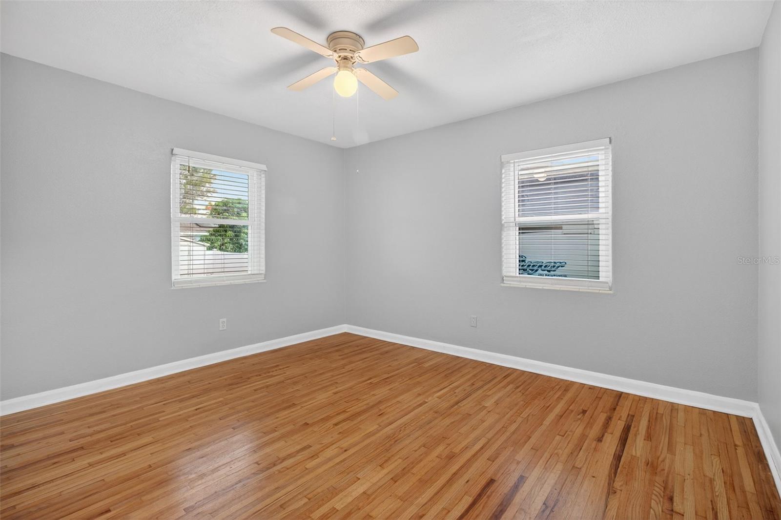 Bedroom 2 has hardwood floors.