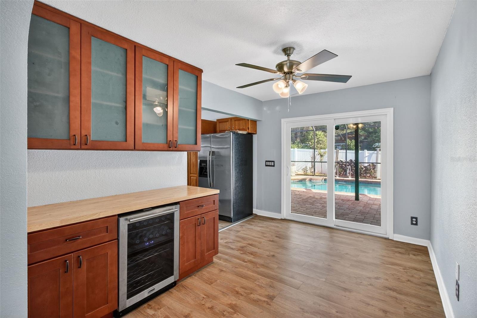 Enjoy the view of the pool from the Dining Room area