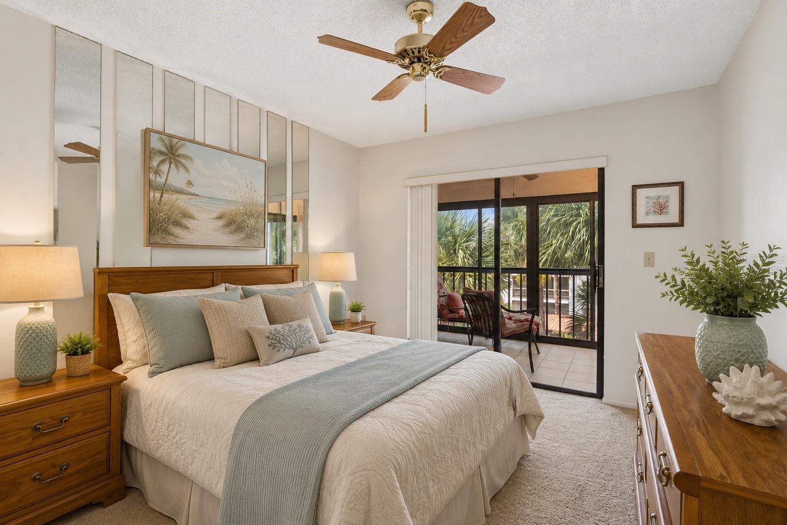 Secondary Bedroom with balcony access, virtually staged