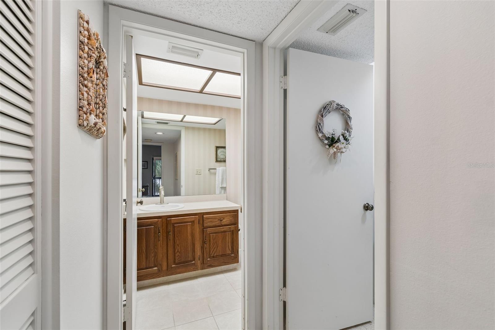 Hall to Laundry Room & Guest Bathroom