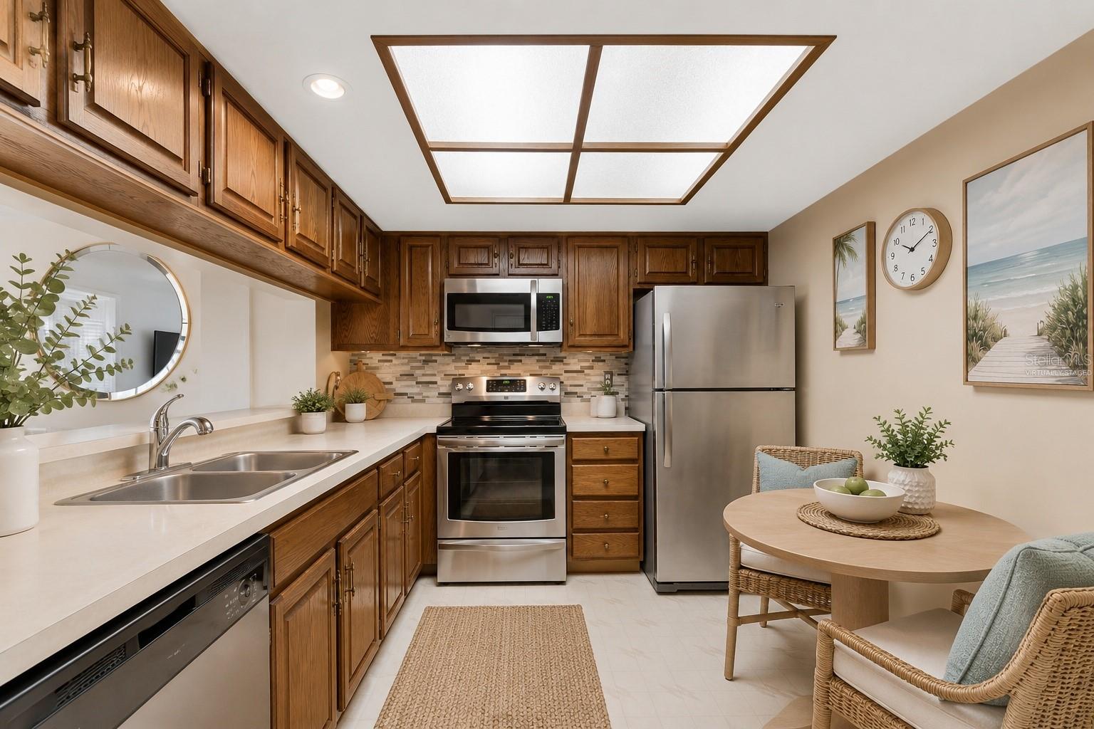 Kitchen with bistro seating, virtually staged